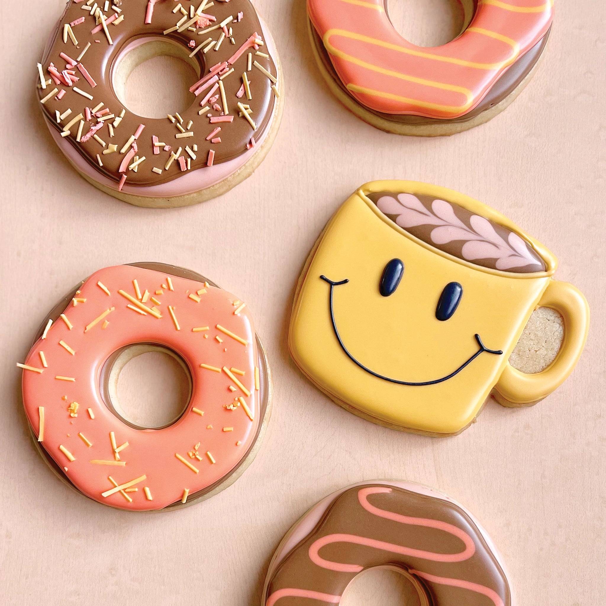 cookies decorated as donuts and coffee