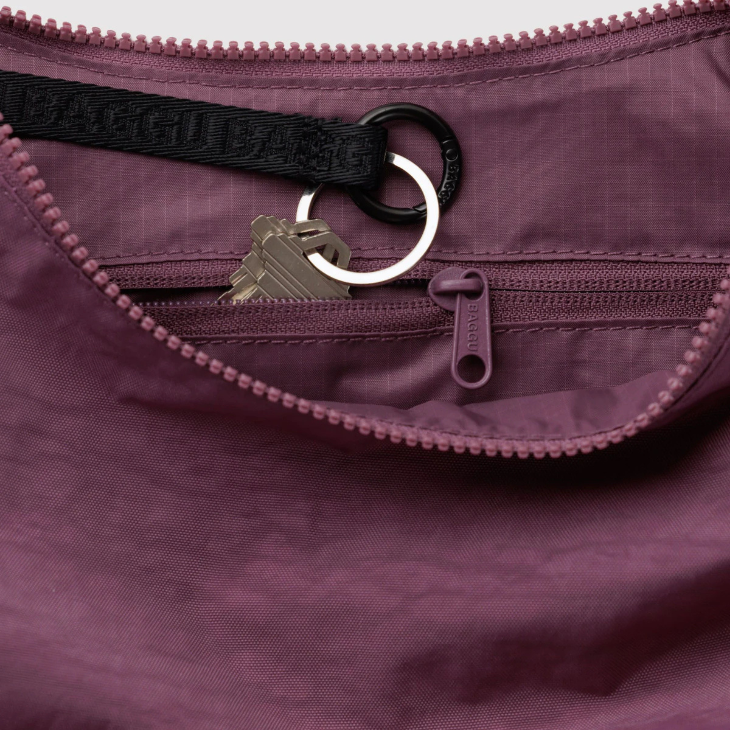 A purple crescent bag shoulder bag.