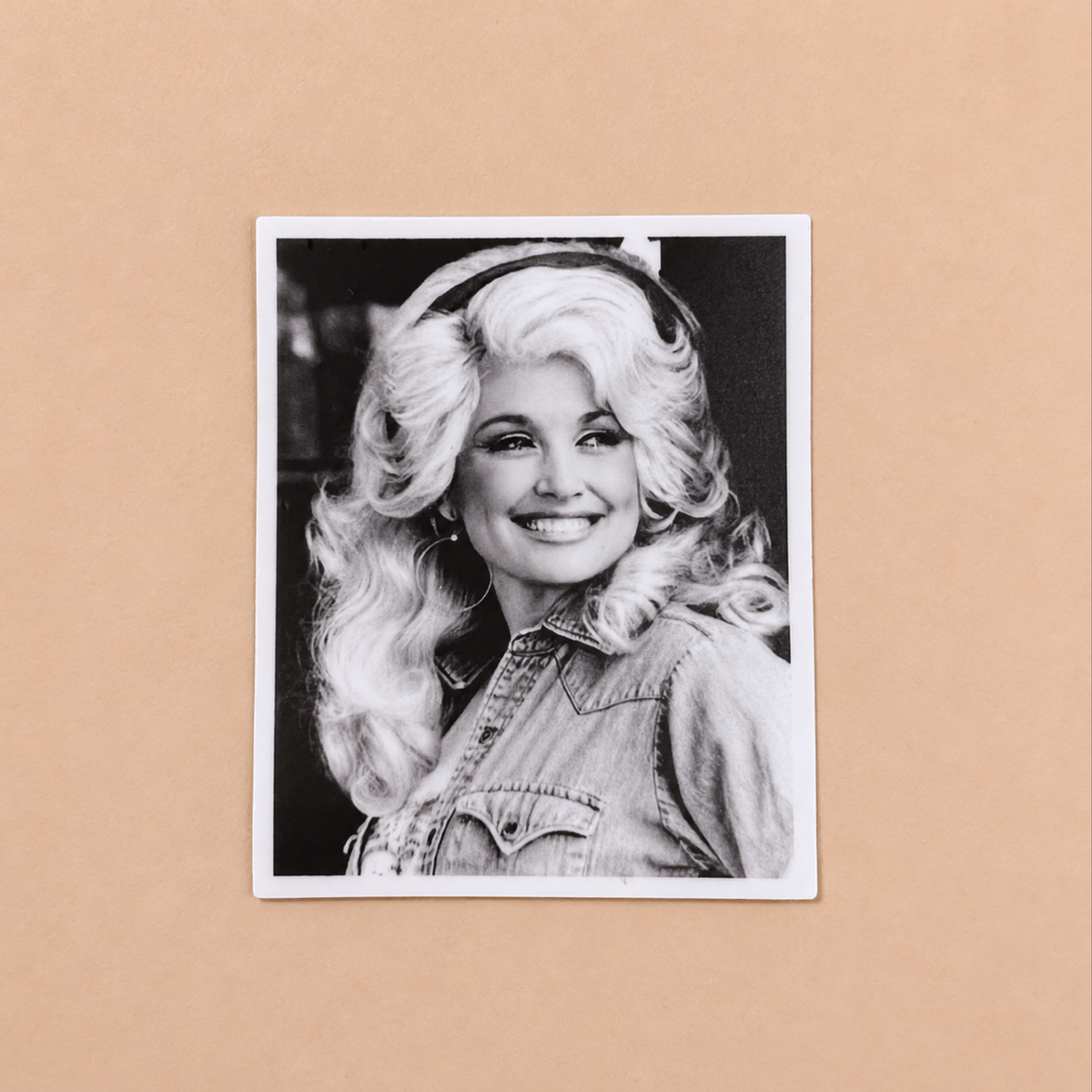 a sticker that looks like a photo of dolly