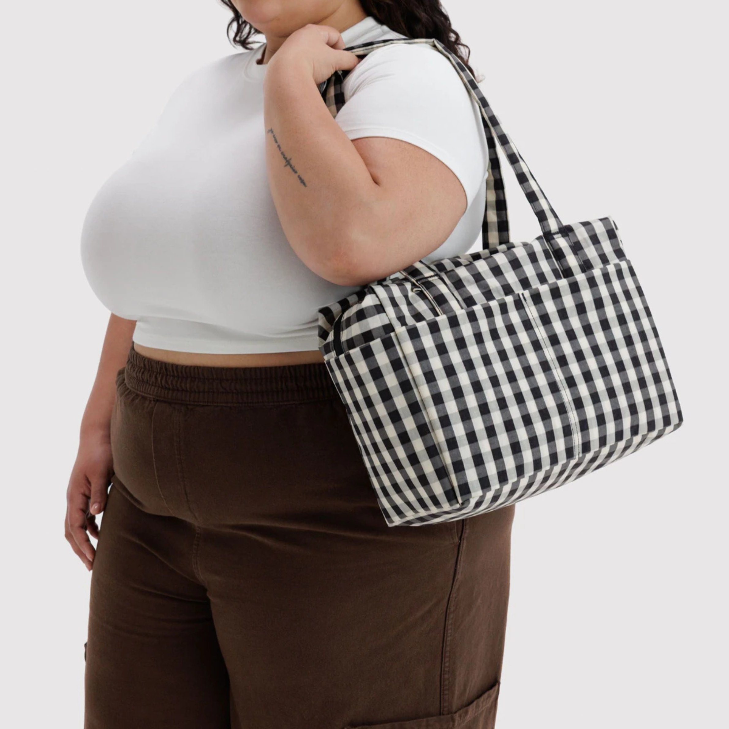 A black and cream gingham everyday cloud bag.