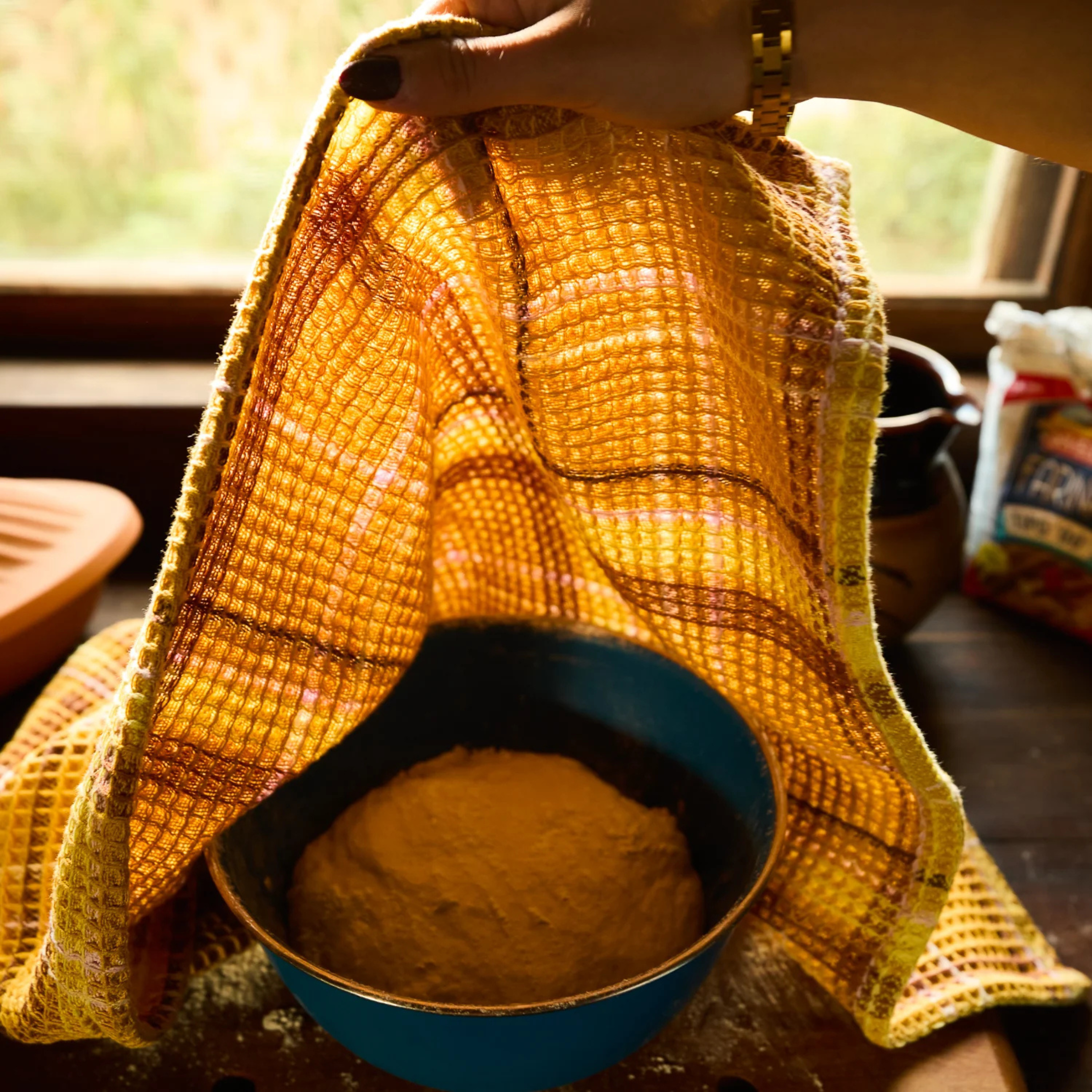 a yellow waffle knit towel. 