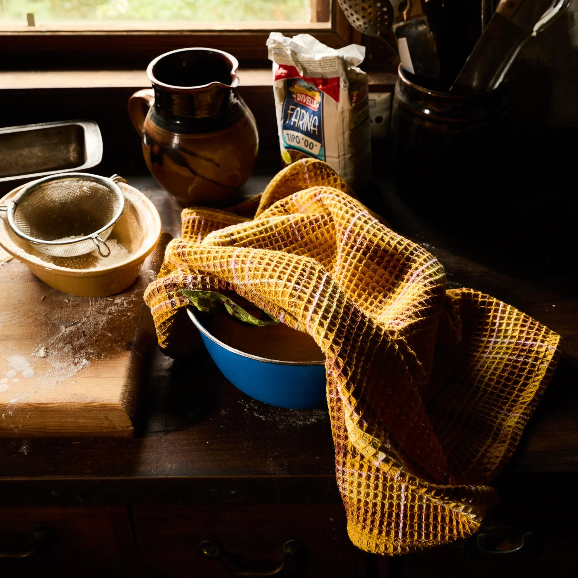 a yellow waffle knit towel. 