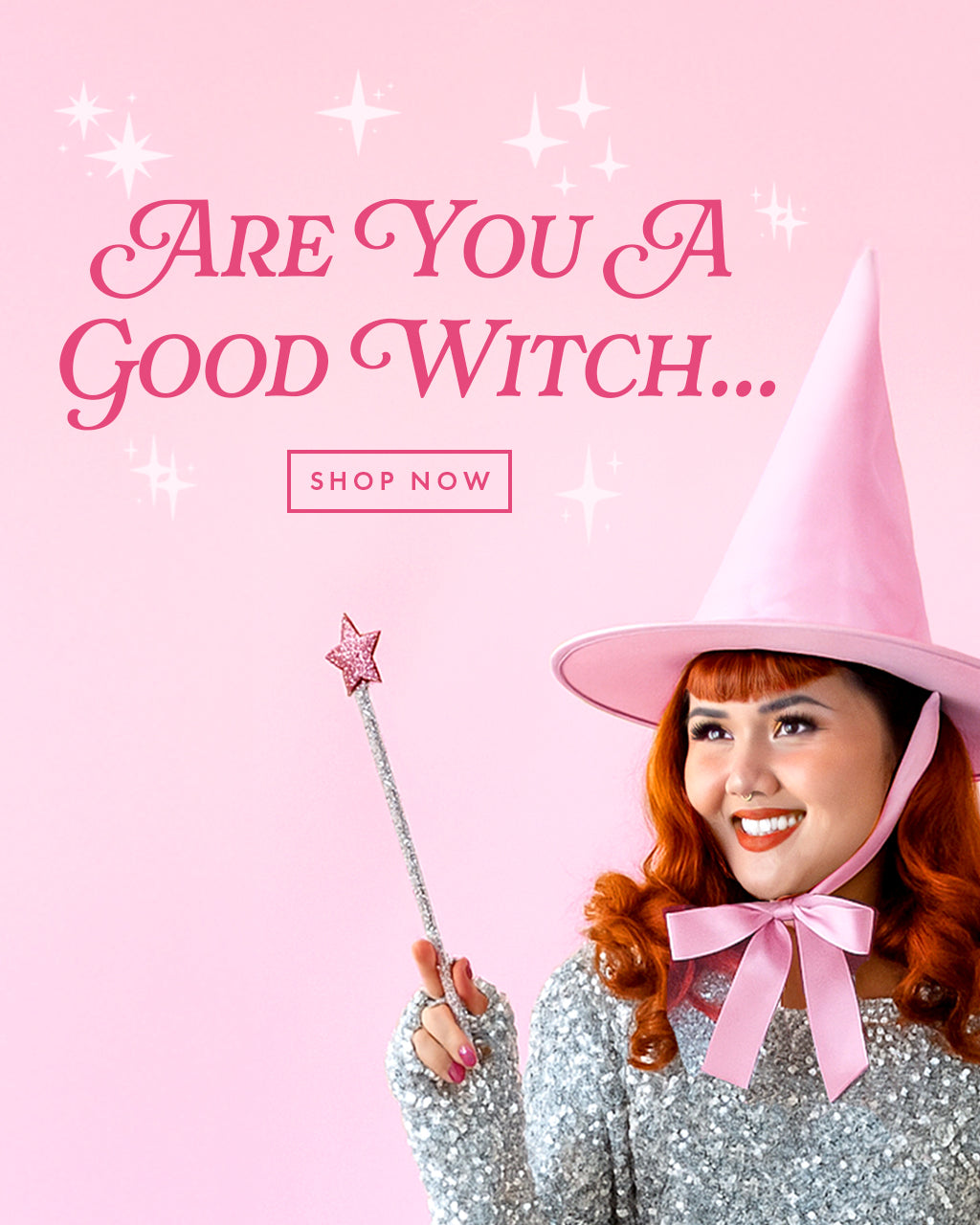 A pink web banner image of a model wearing a pink witch hat with red hair. The text next to her reads "are you a good witch..."