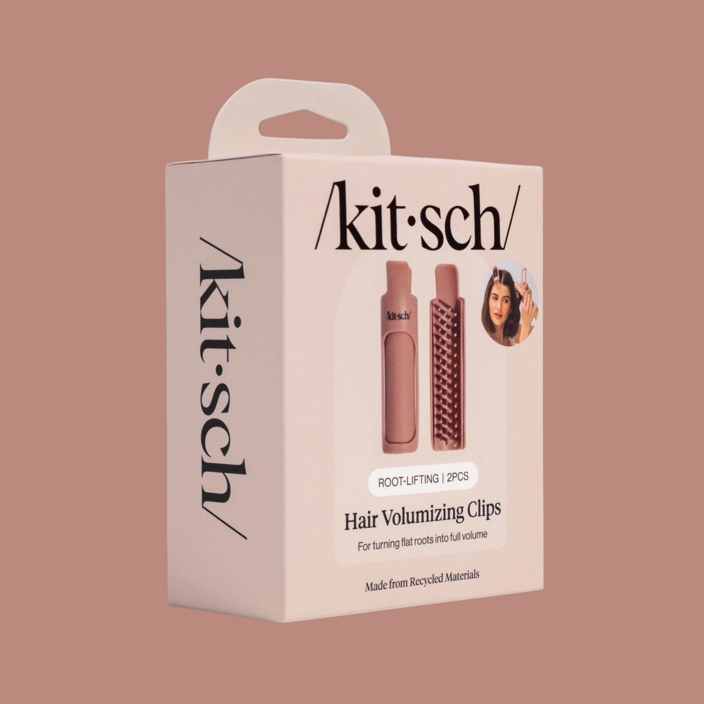 a pair of hair volumizing rollers. 
