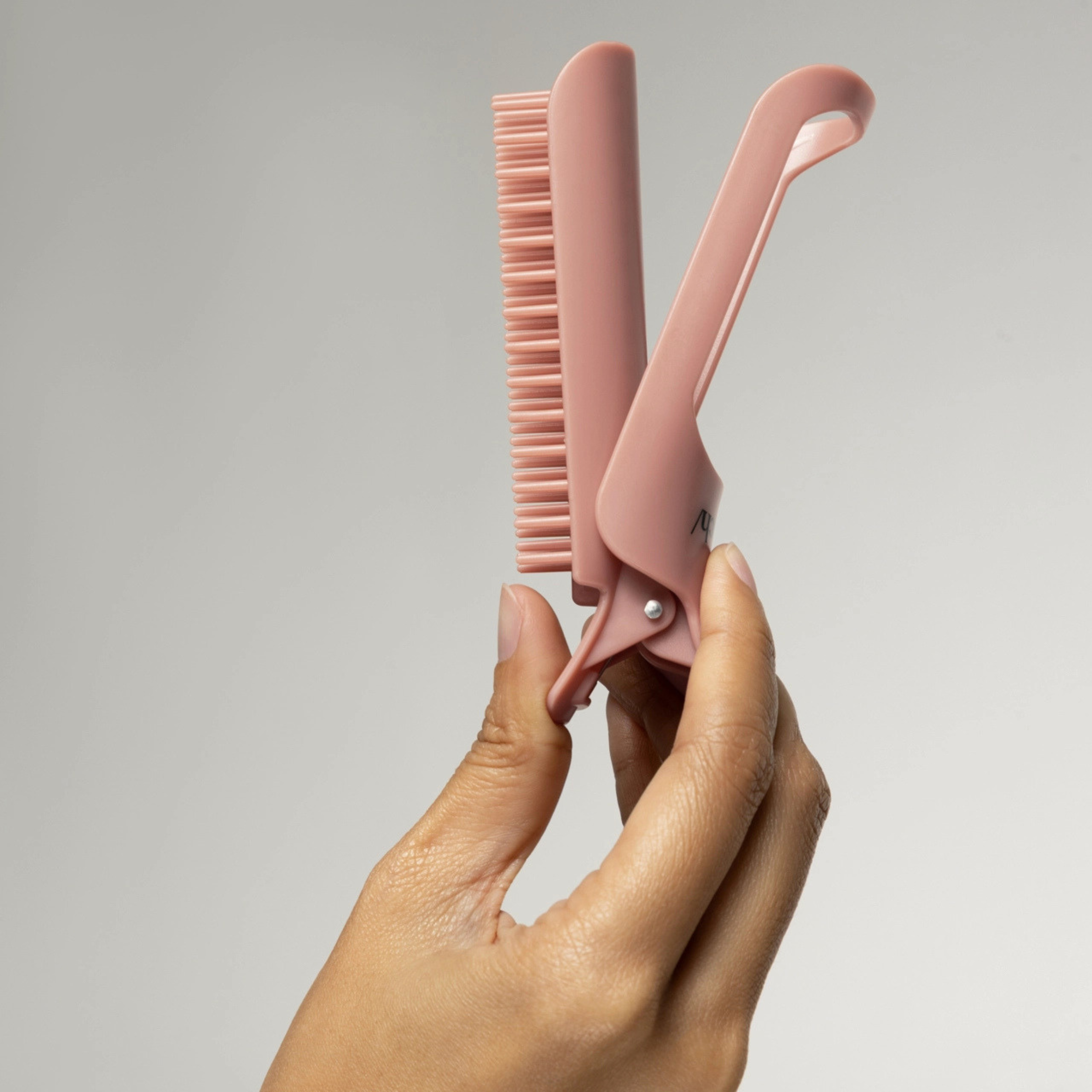 a pair of hair volumizing rollers. 