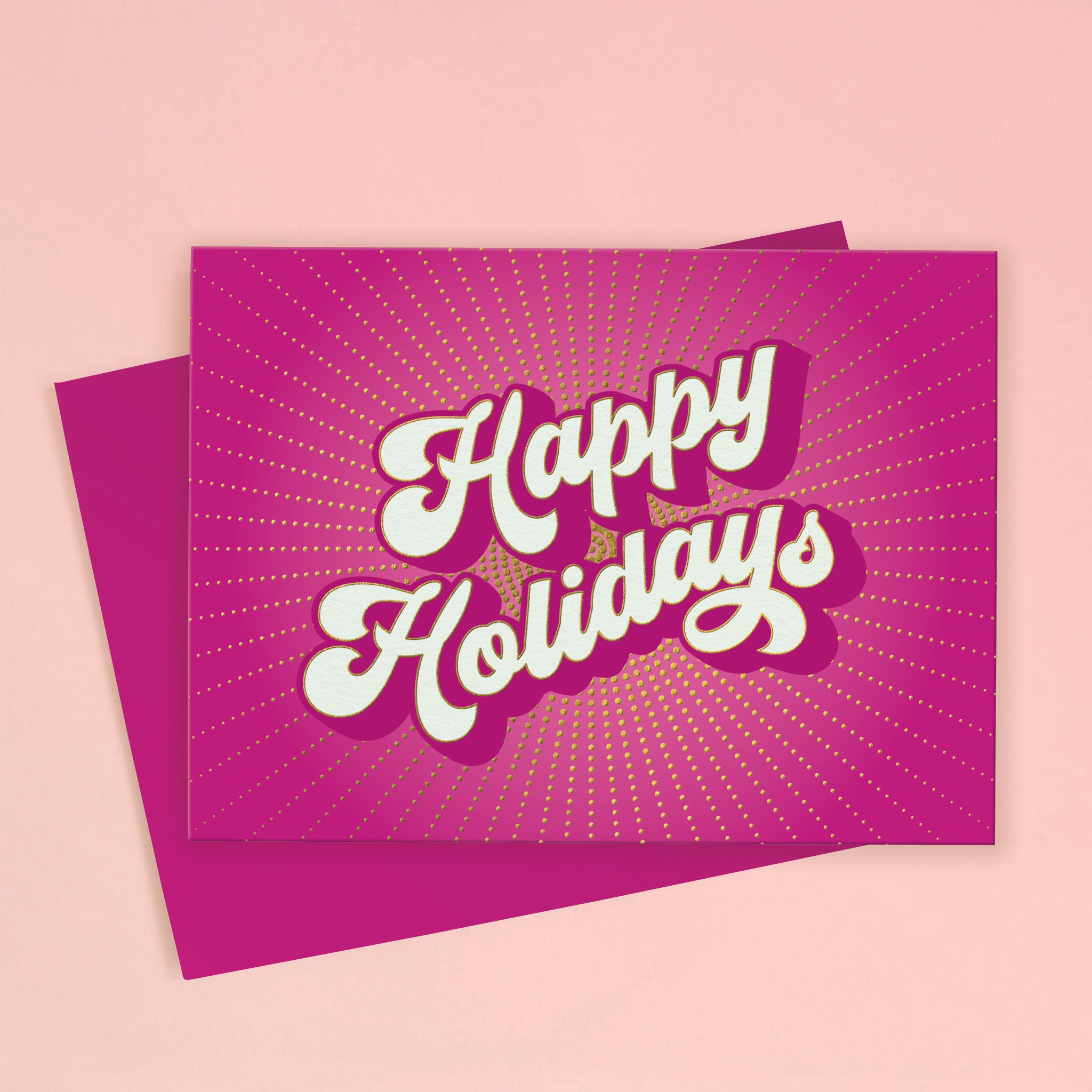A hot pink holiday card with text in the center that reads, 'Happy Holidays'. 