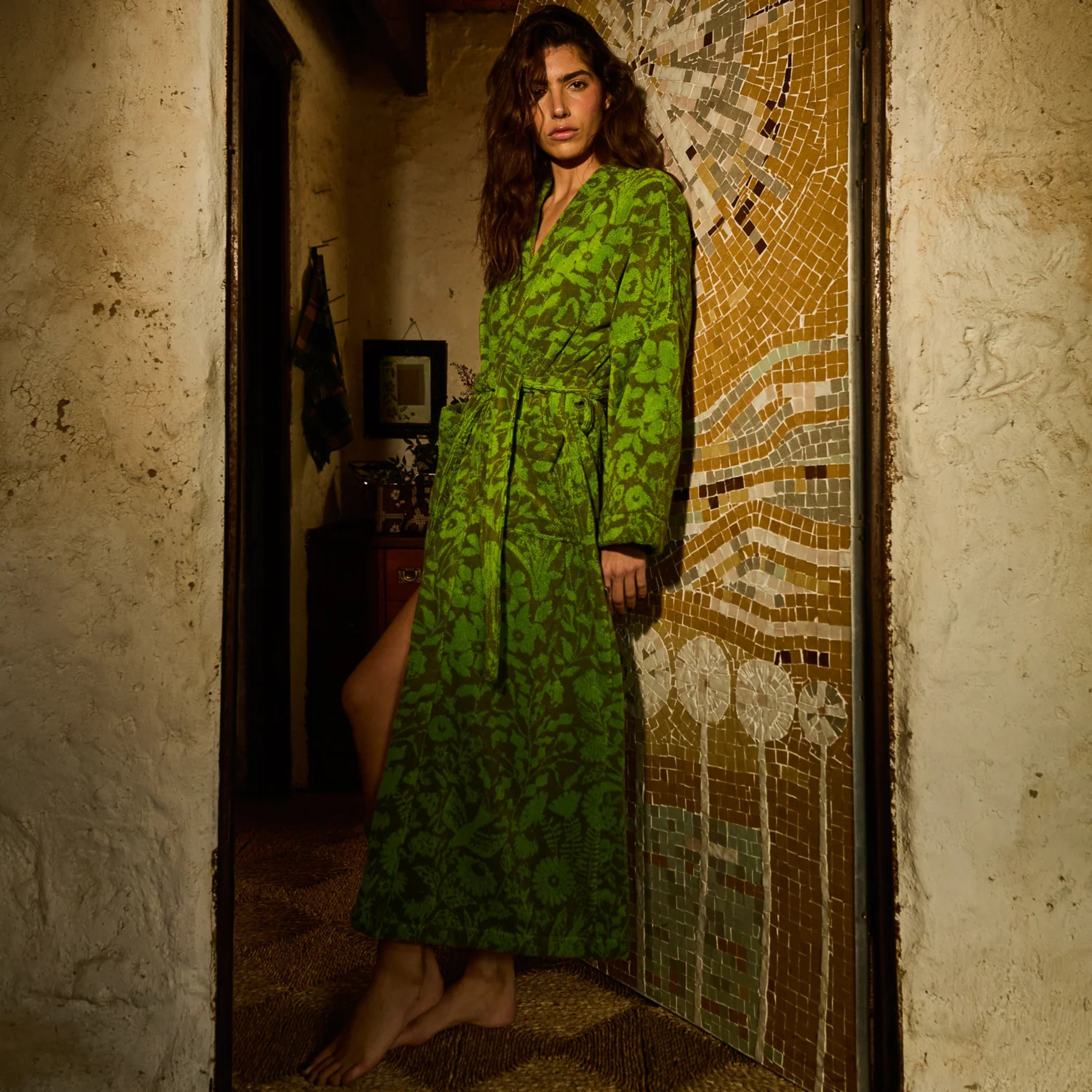 a green floral print bathrobe