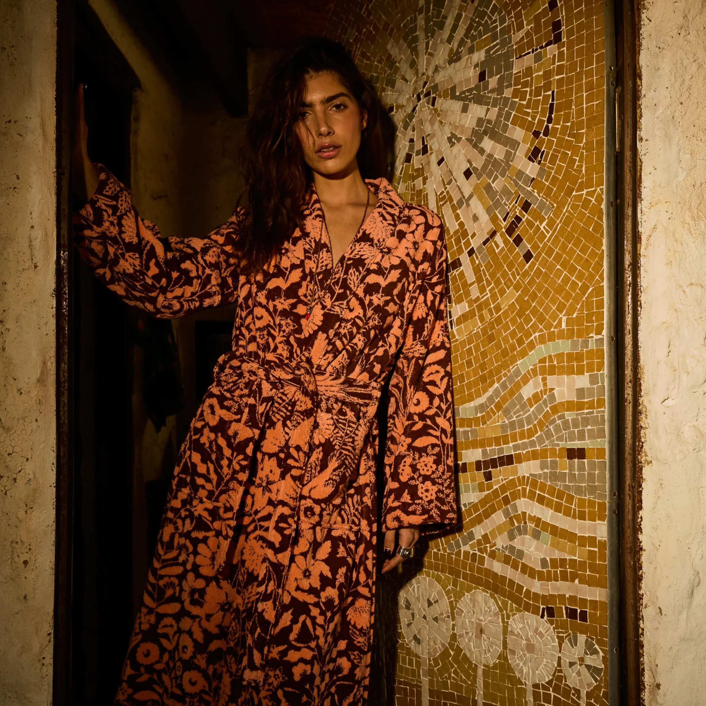 a burgundy and pink floral print bathrobe 