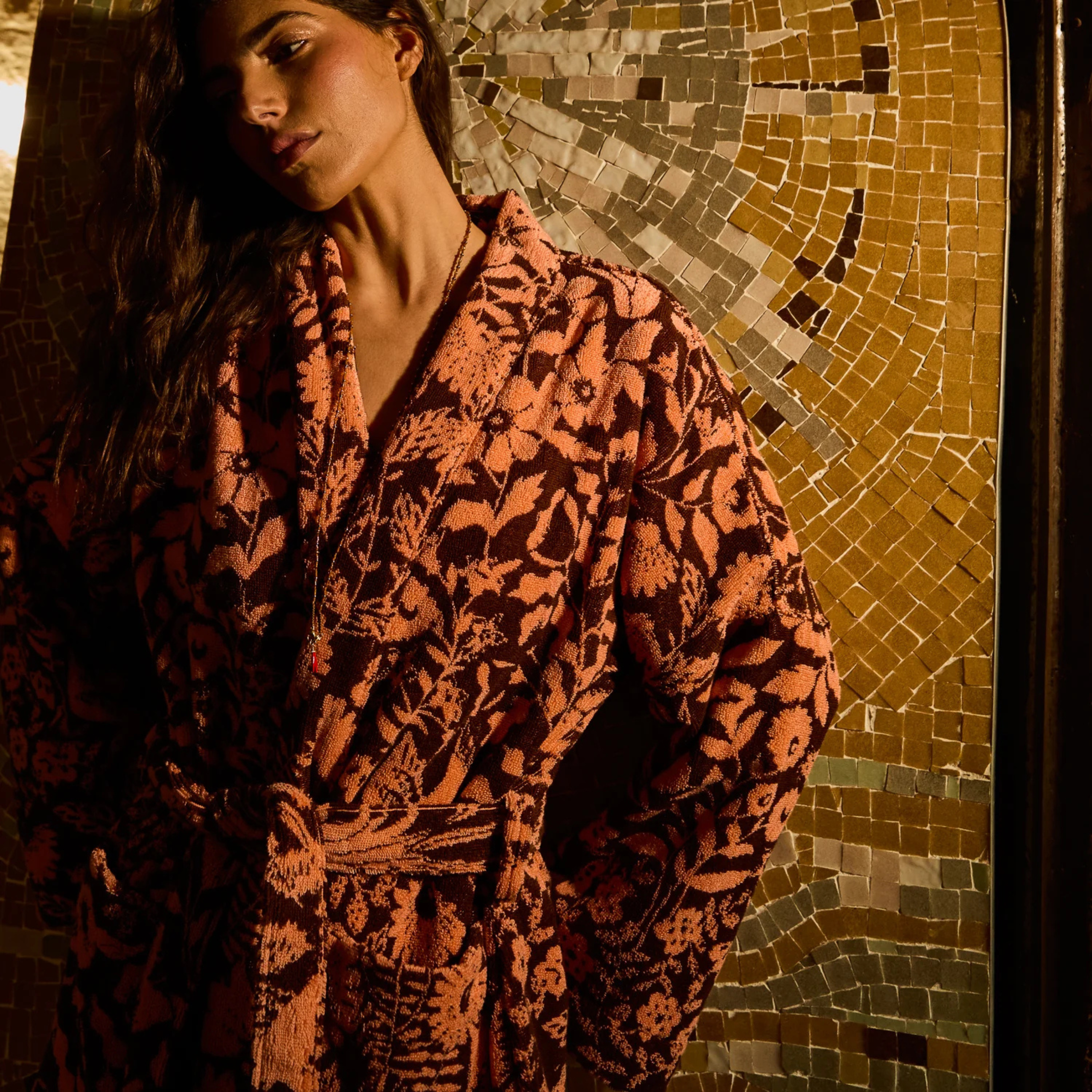 a burgundy and pink floral print bathrobe 