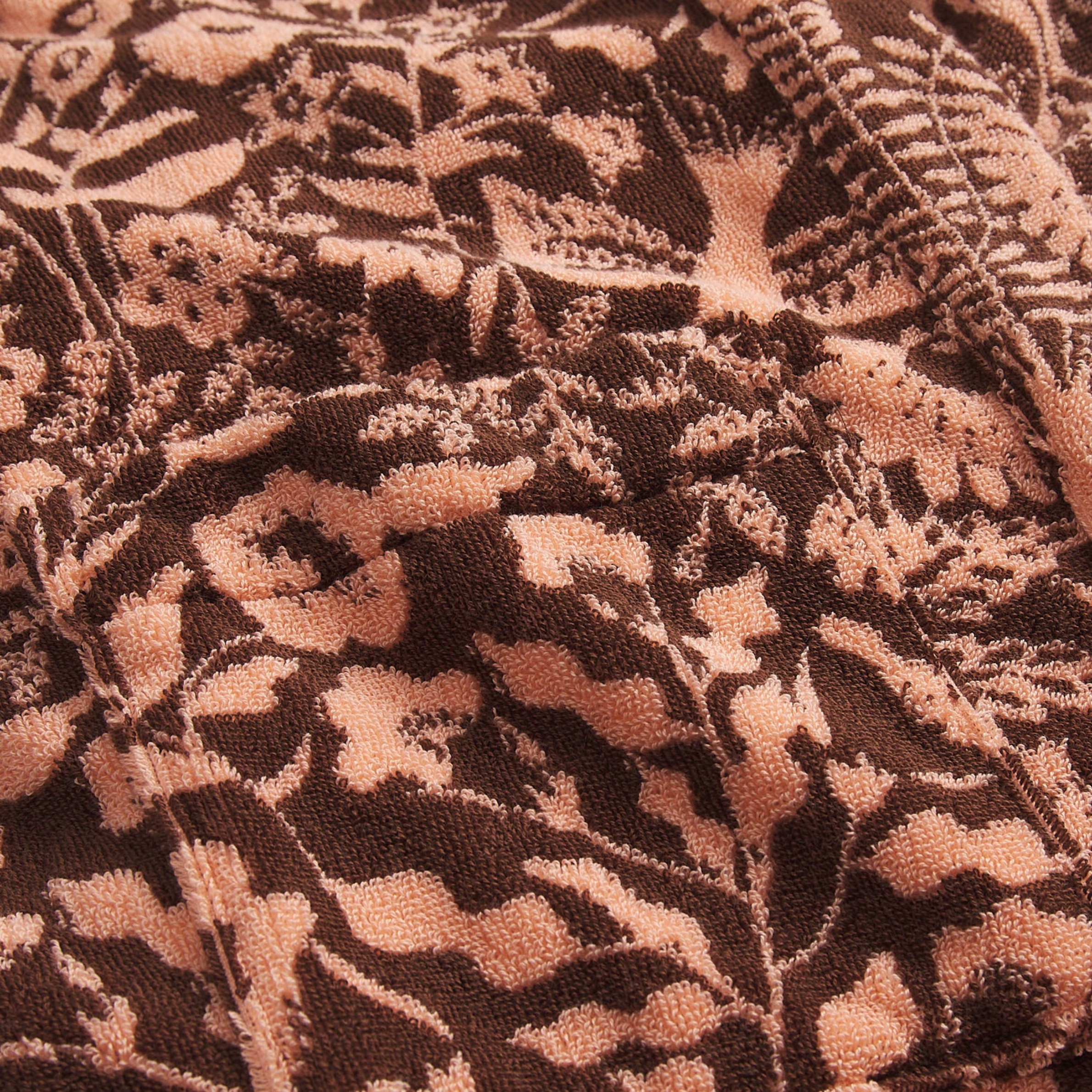 a burgundy and pink floral print bathrobe 