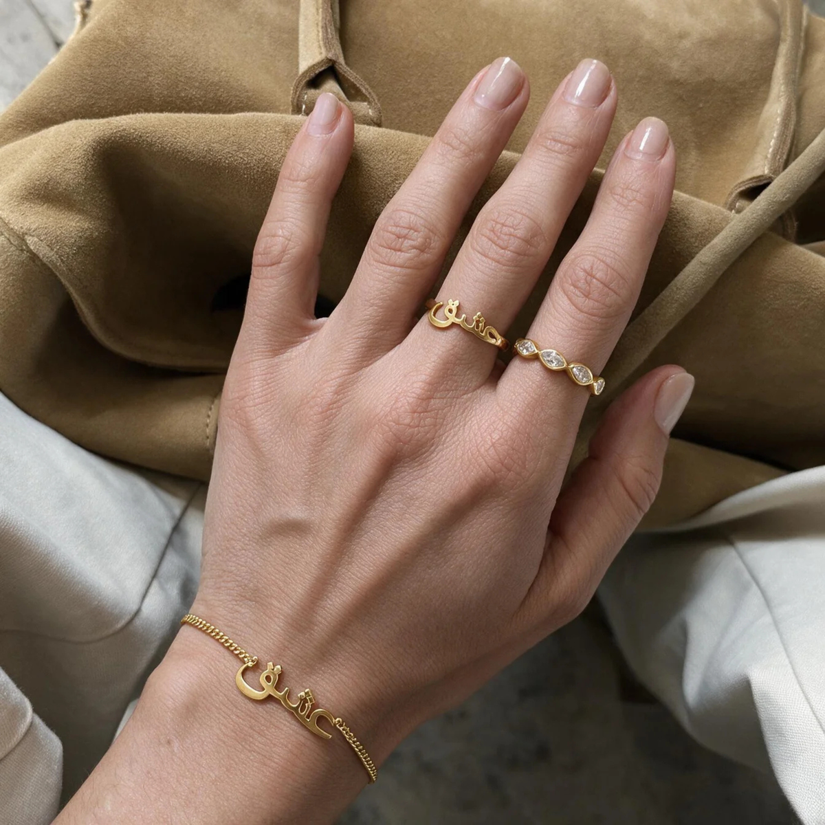 a gold ring with cz stones set within it.