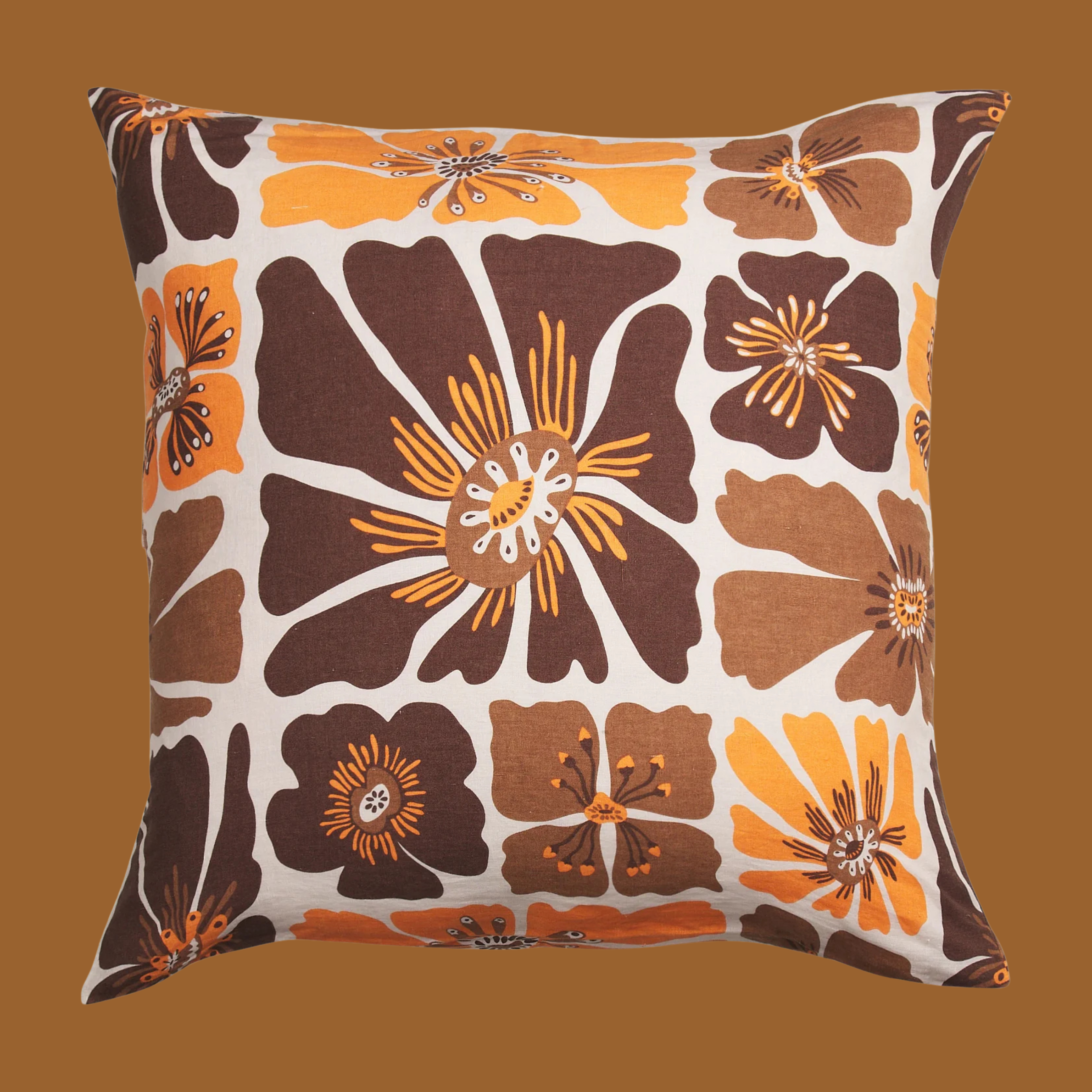 a brown and yellow floral print pillow. 