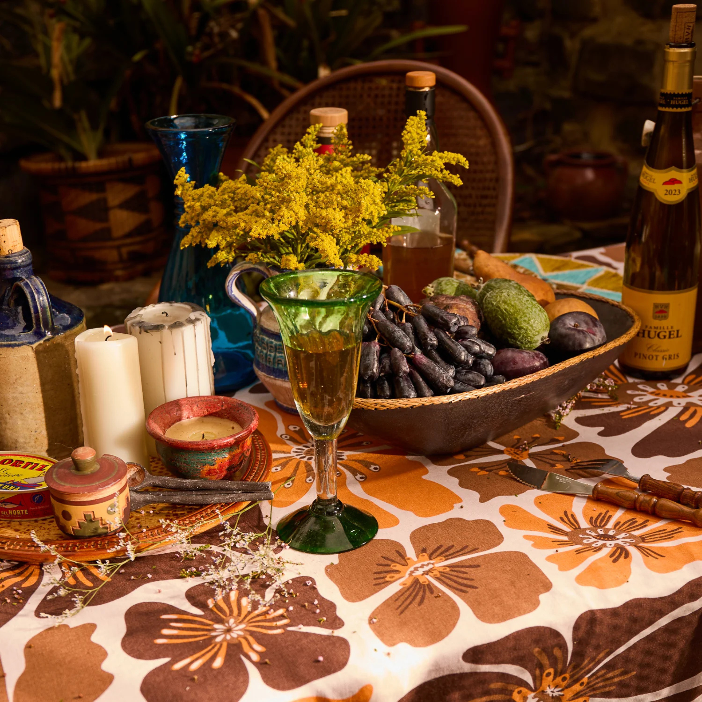 a brown and yellow floral print table cloth. 