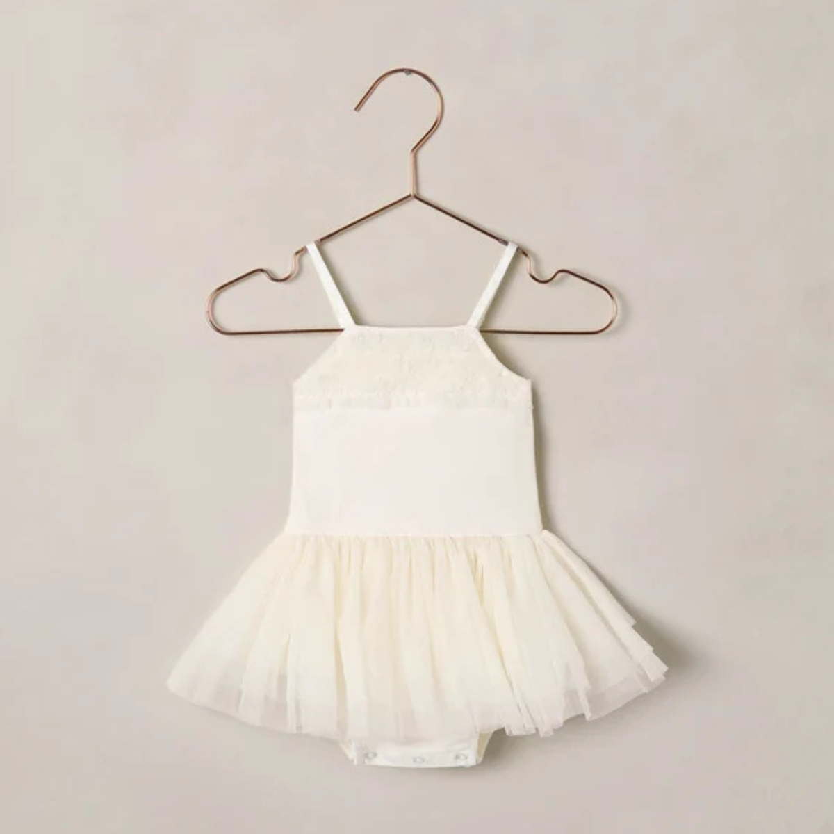 A white tutu onesie