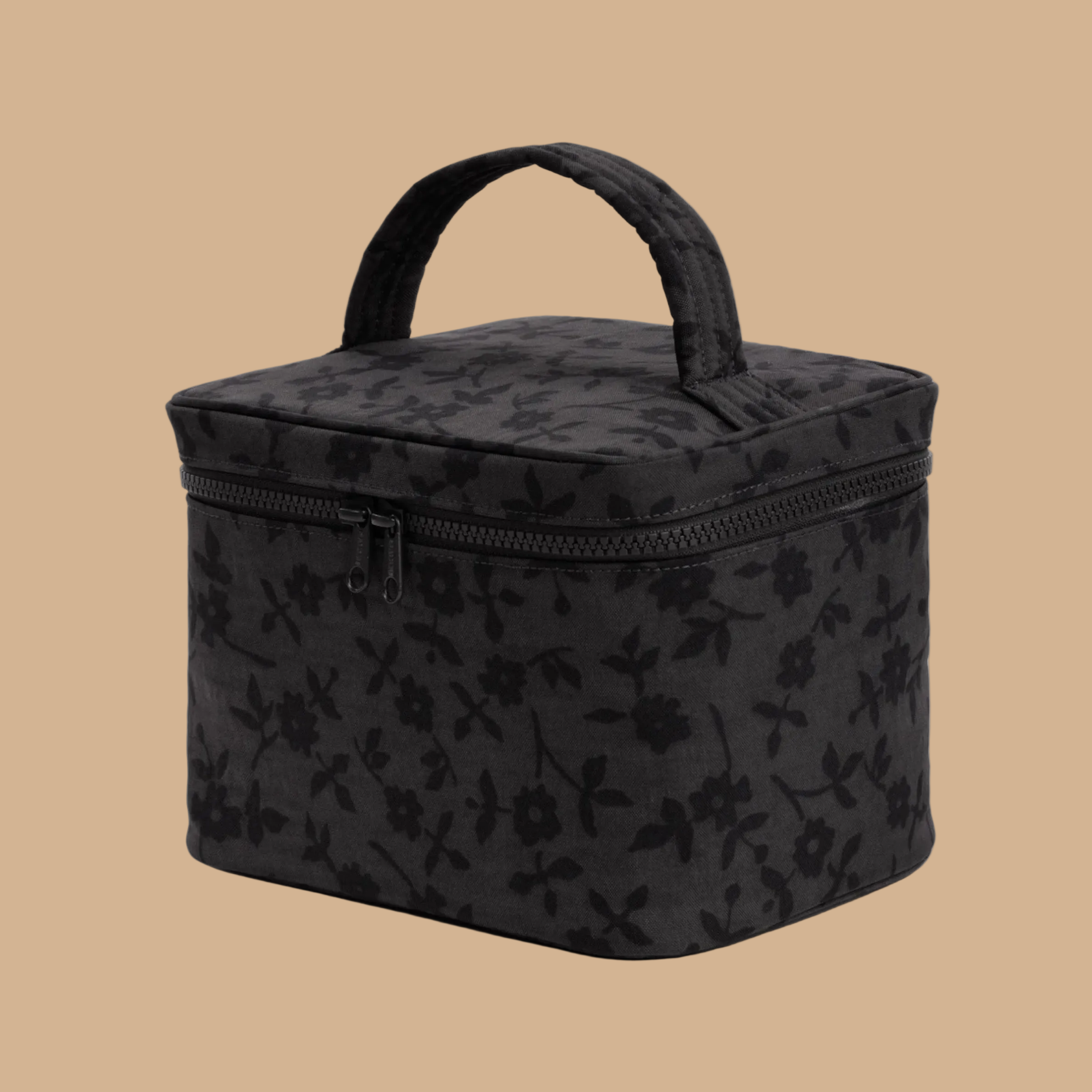 A grey and black floral print cosmetic case. 