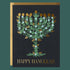 A black card with a leafy menorah shape and text that reads, 'Happy Hanukkah'. 