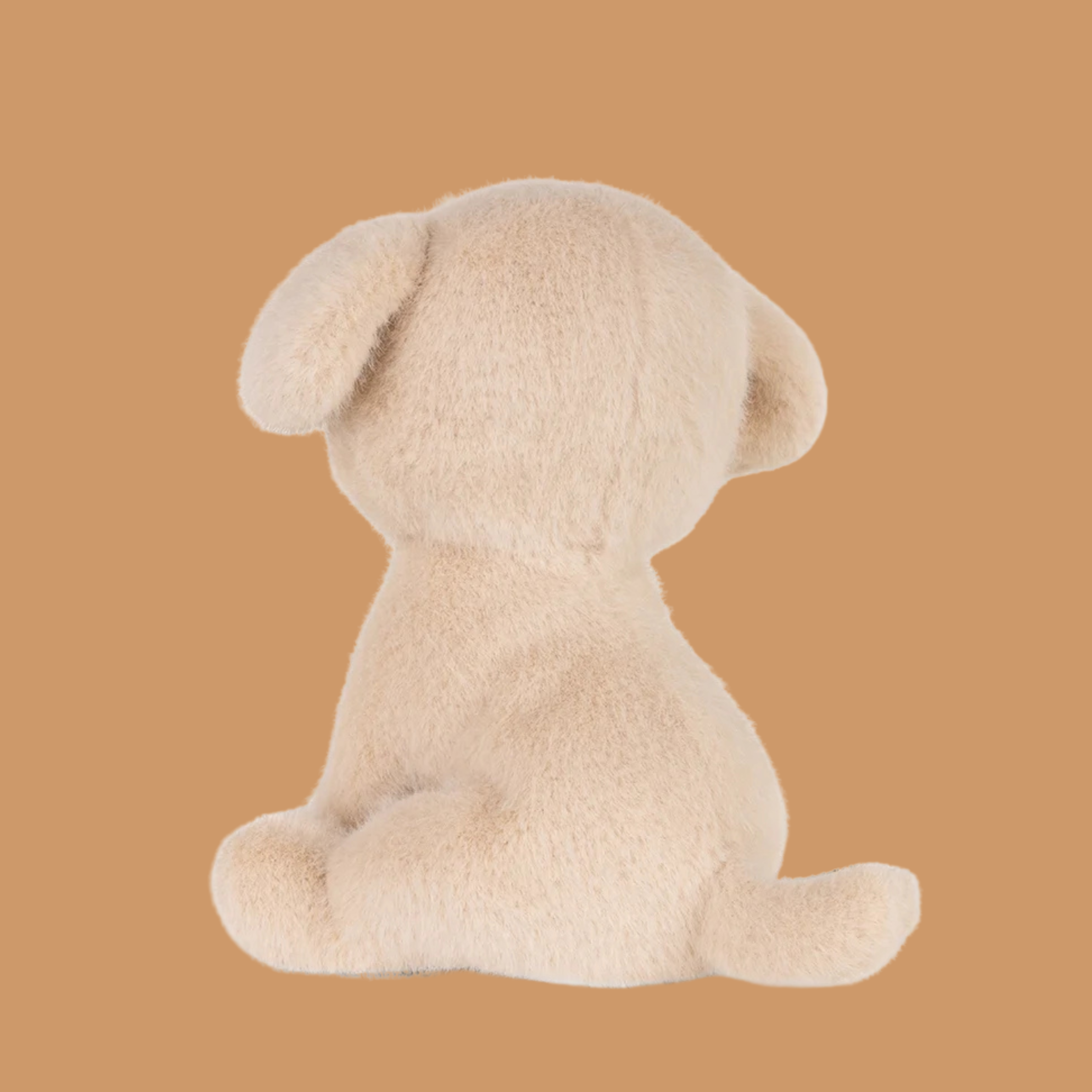a cream dog colored dog stuffed animal toy.