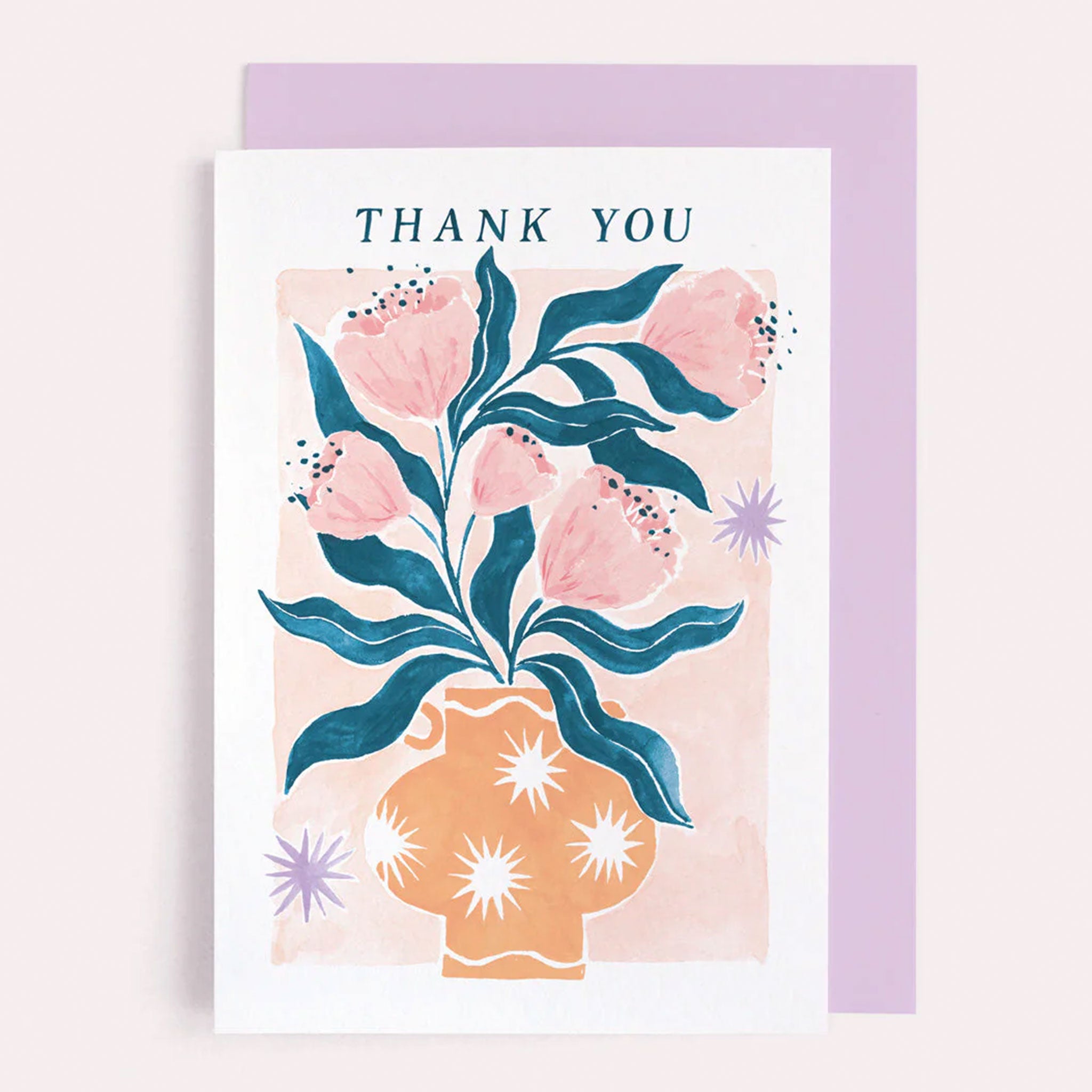 On a neutral background is a card with an illustration of a  vase and flowers and text above that reads, "Thank You". 