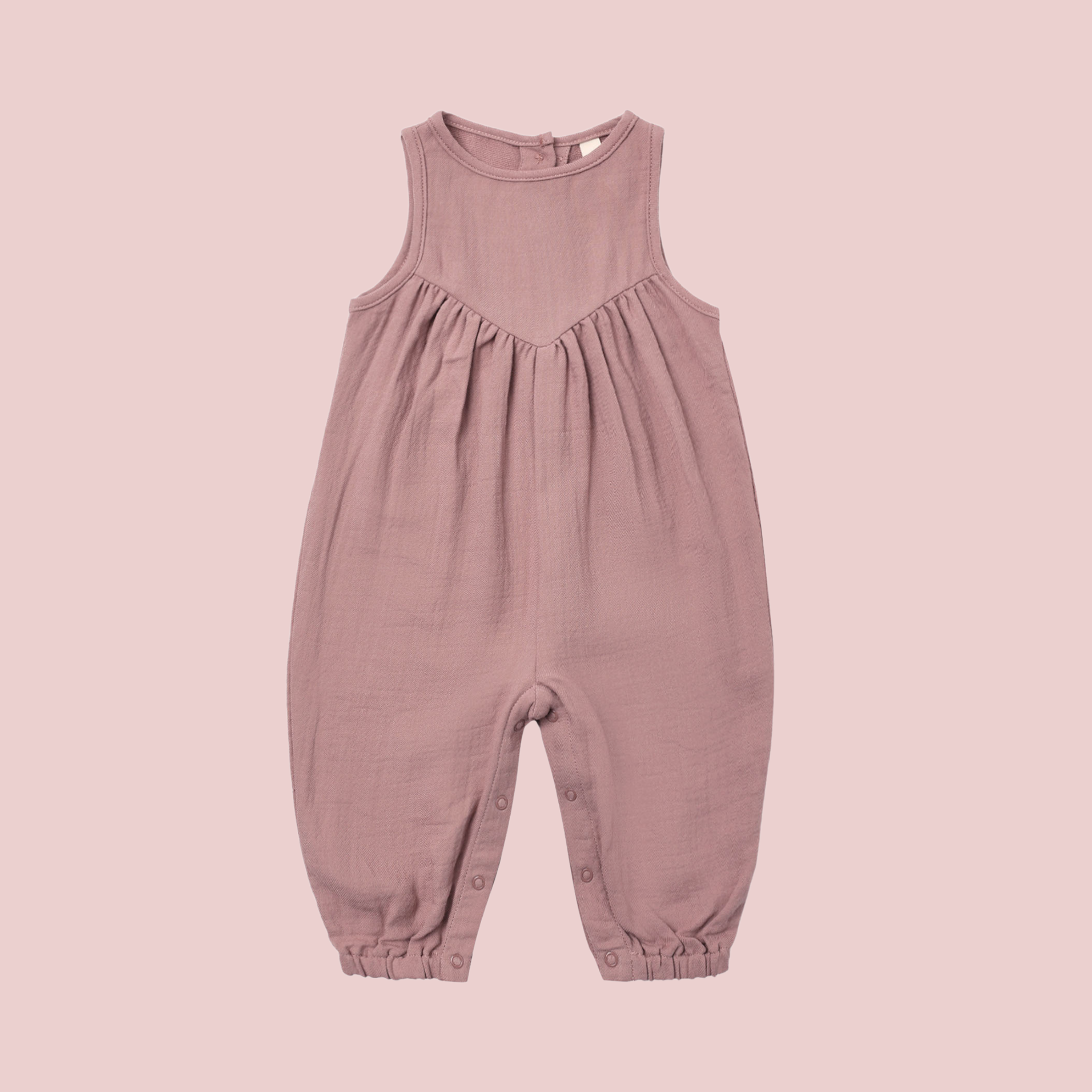 A mauve pink overalls. 