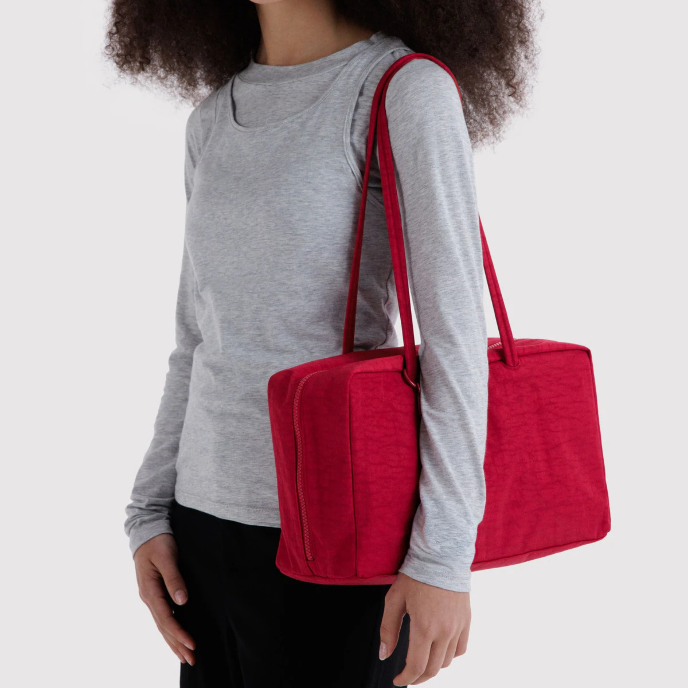 A cherry red medium handbag. 