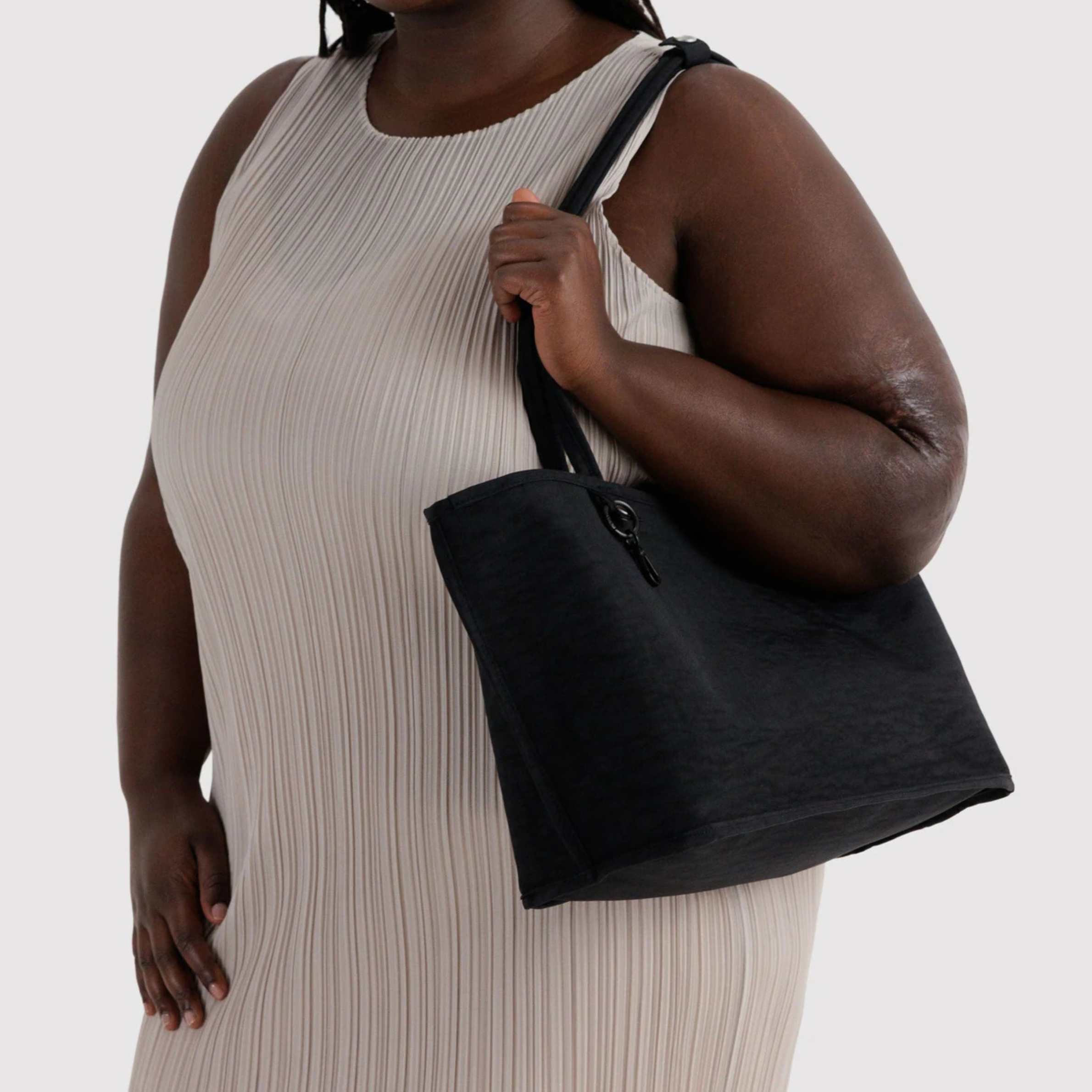 A black and leopard reversible tote.