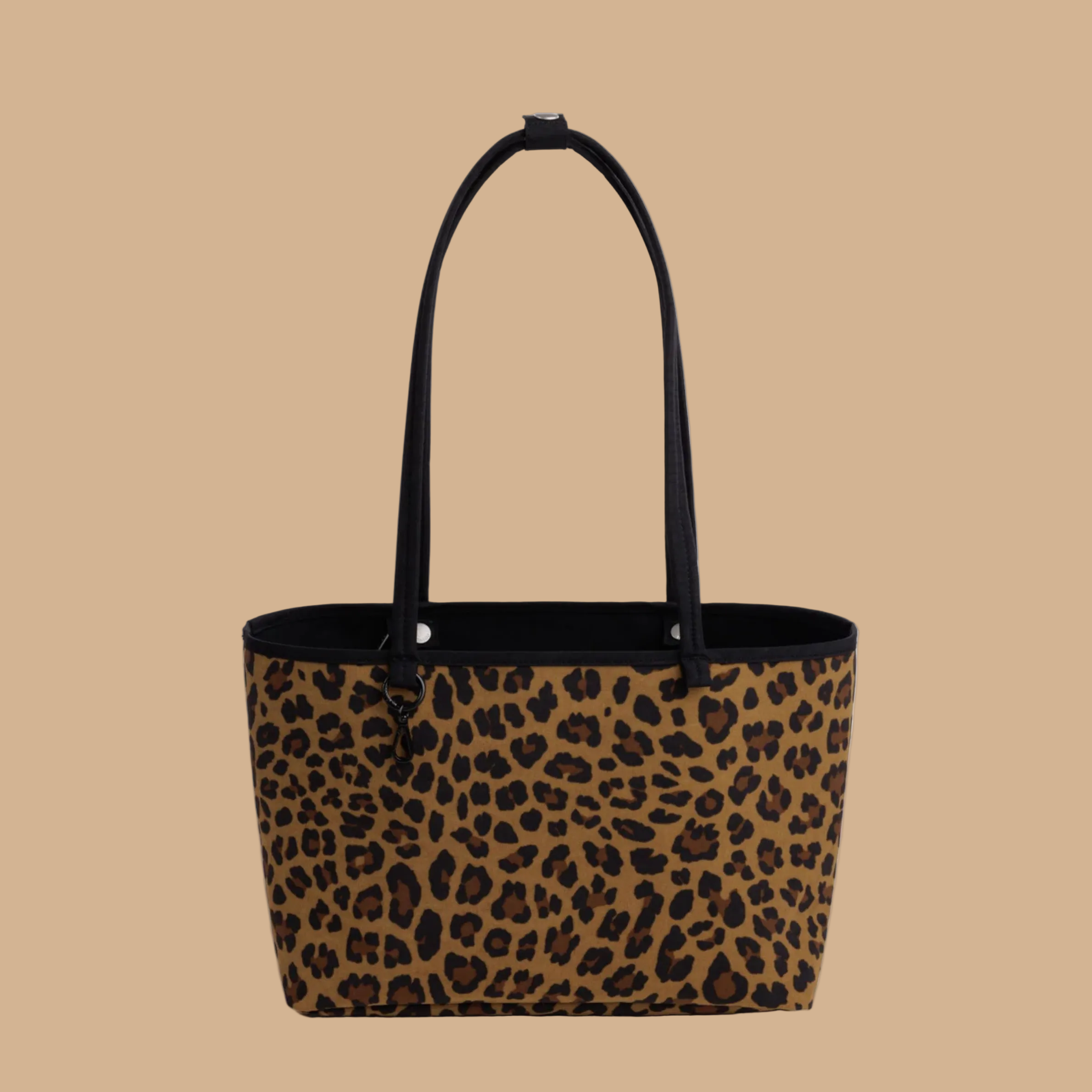 A black and leopard reversible tote.
