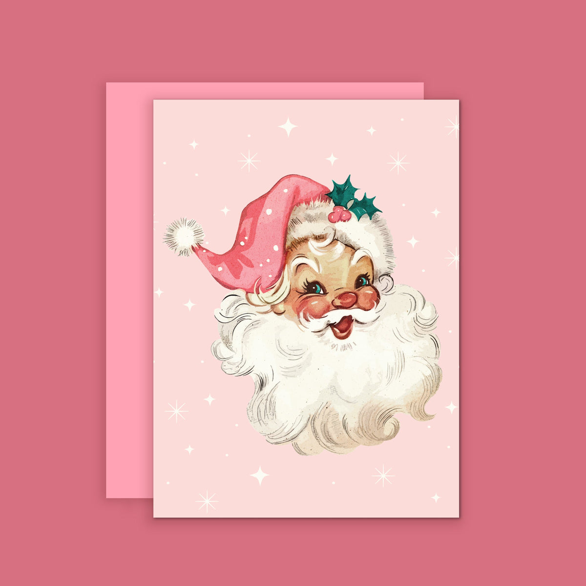 A pink card with a vintage inspired illustration of Santa wearing a pink hat. 