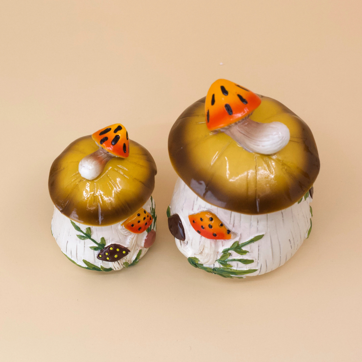 a set of hand painted mushroom trinket dishes.