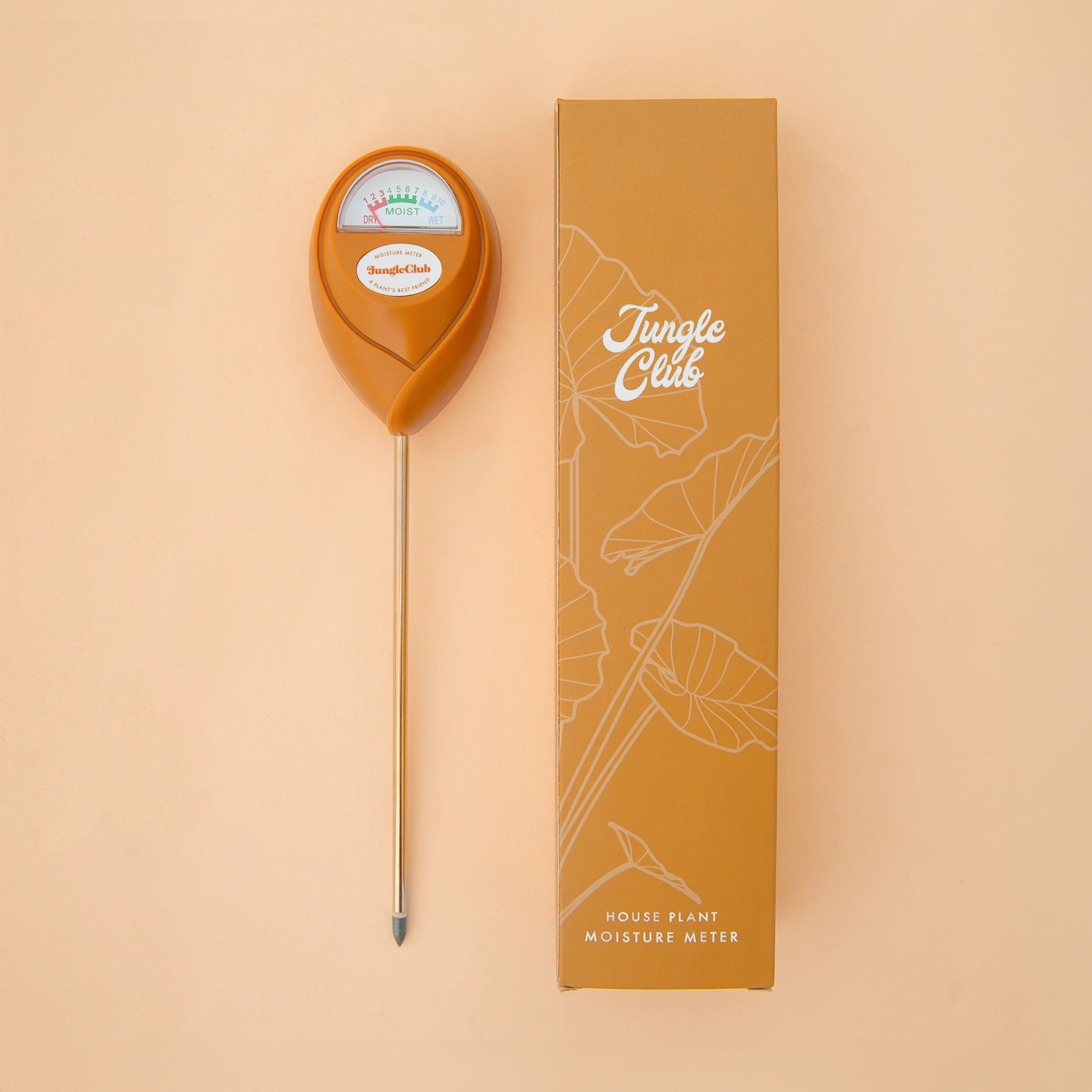 An orange moisture meter with a rounded head and a white meter that ranges from dry, moist, or wet along with a small oval label in the front that reads, "Jungle Club".