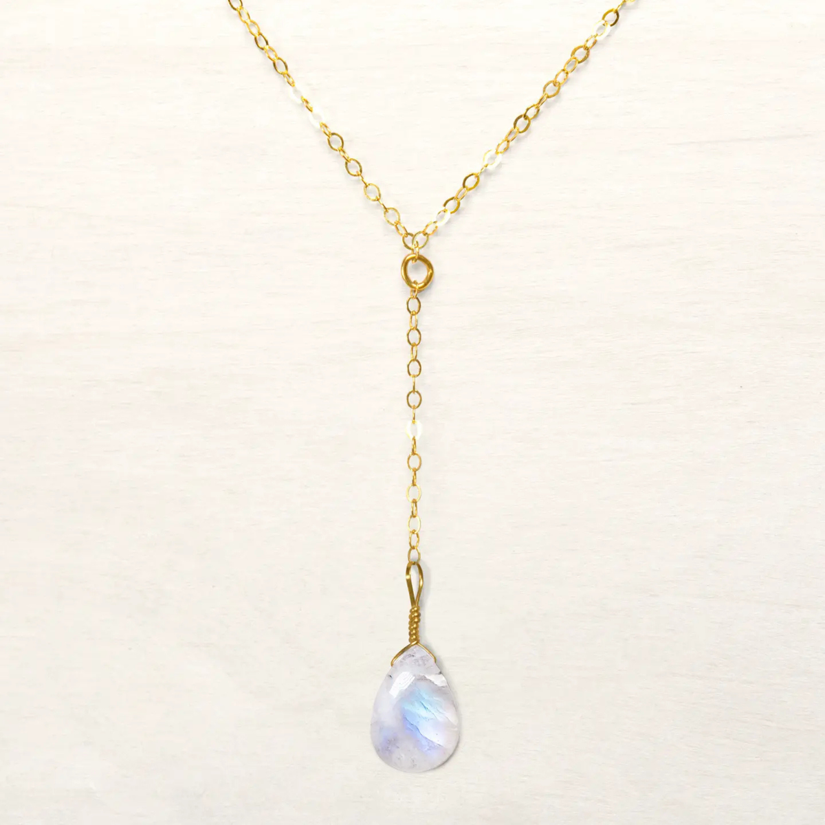 a moonstone gold chain necklace. 
