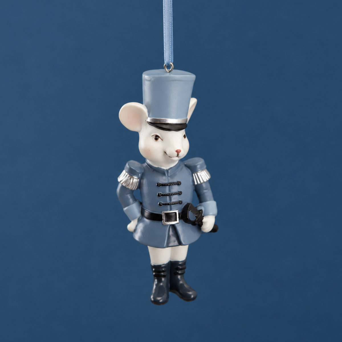 a blue and white mouse soldier ornament. 