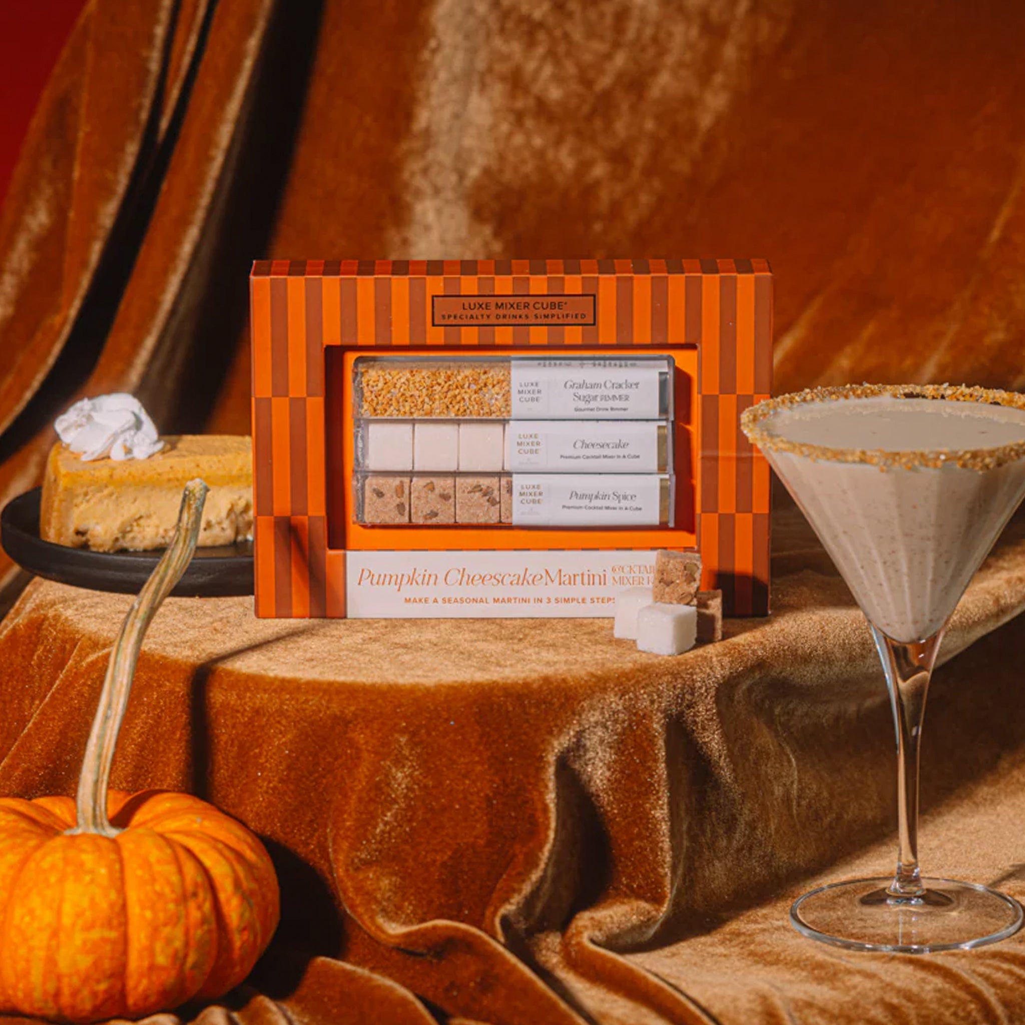 A box of a pumpkin flavored sugar cubes with text that reads, 'Pumpkin Cheesecake Martini'.