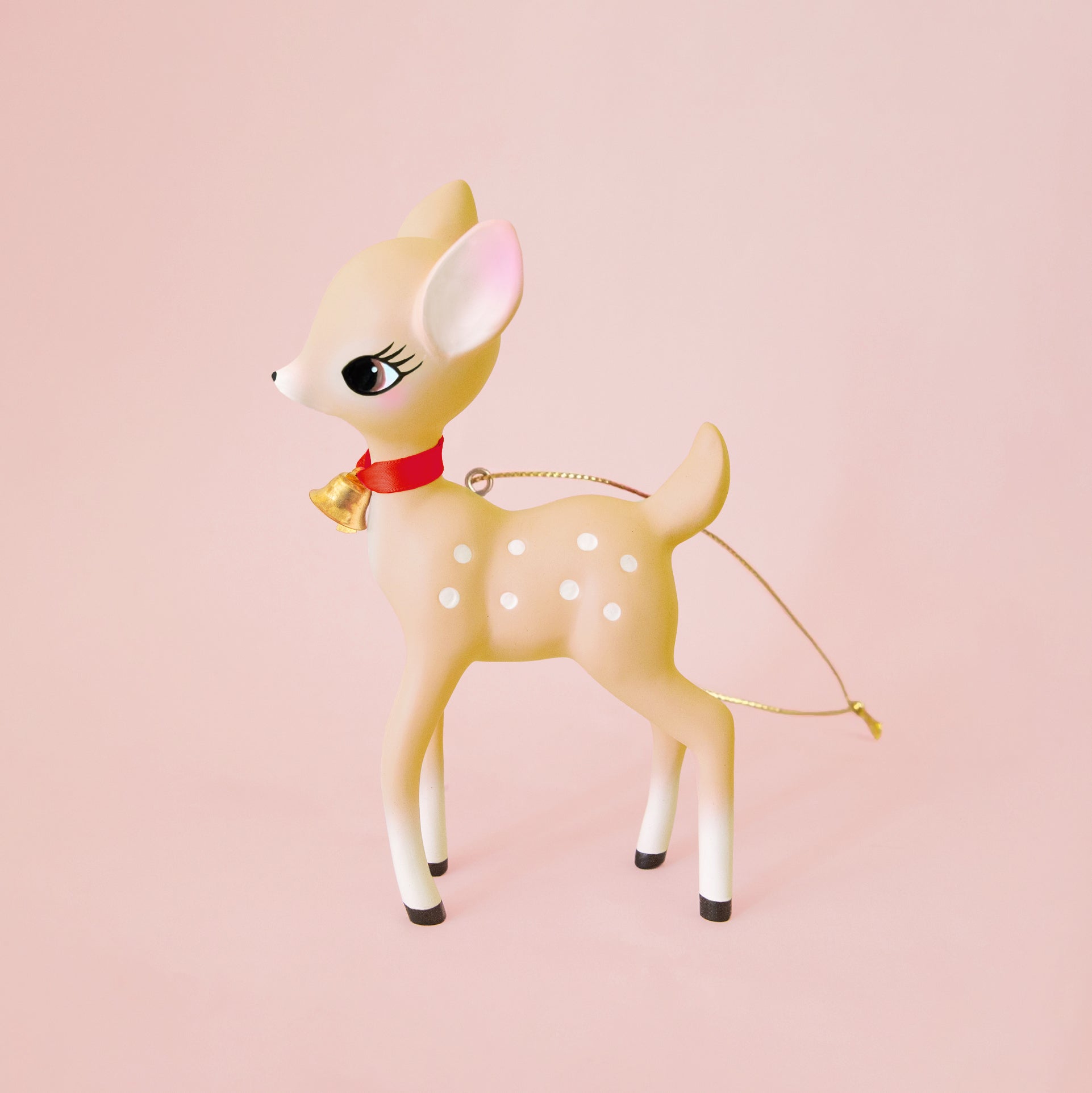 A tan retro deer ornament. 