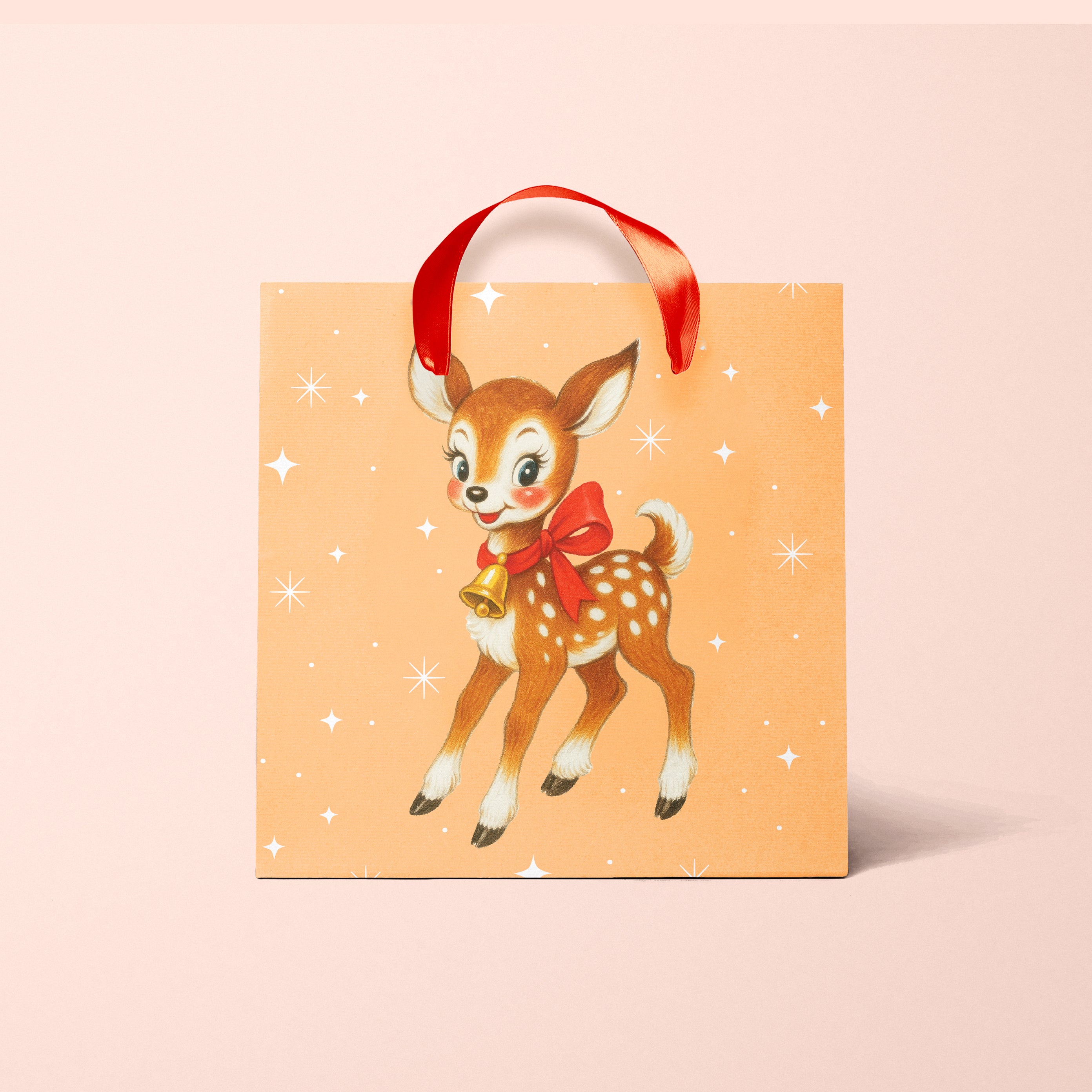 A tannish orange bag with a brown retro deer graphic.