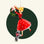 A retro looking girl wearing a big red dress with polka dots.  A gray dog tugs at her dress while she hangs a Christmas wreath.