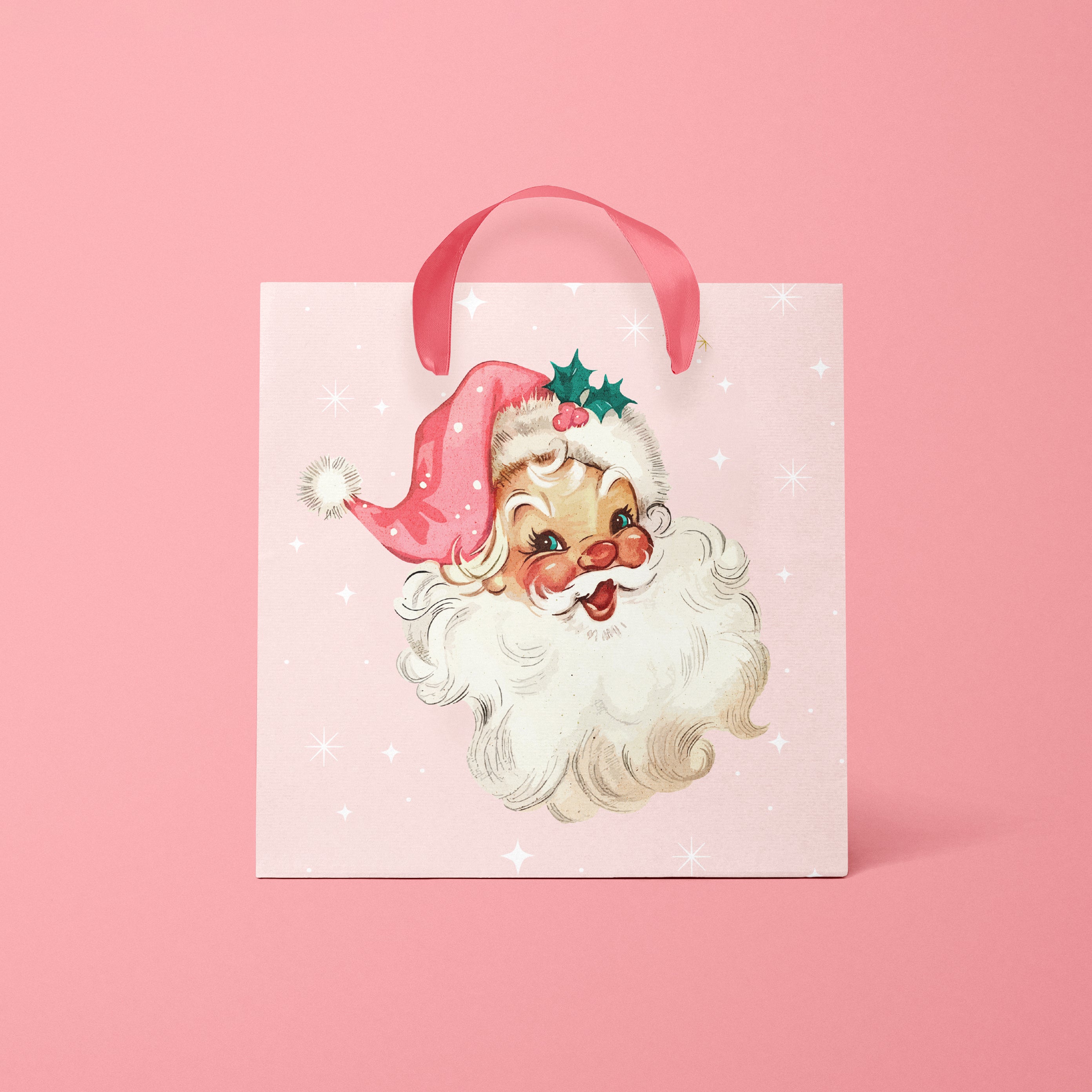 A light pink gift bag with graphics of a retro santa clause. 