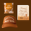 A hat that reads "one tough mother" a greeting card that reads "happy mama's day" and a plastic package of sea salt caramels sit on a brown background.