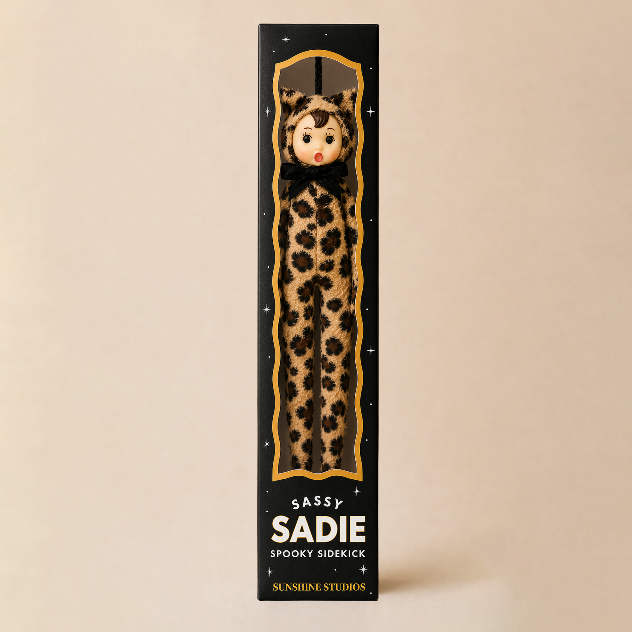 A packaged novelty sidekick doll labeled 'Sassy Sadie Spooky Sidekick' by Sunshine Studios, shown in a tall black box with a leopard-print figure visible through a windowed front.