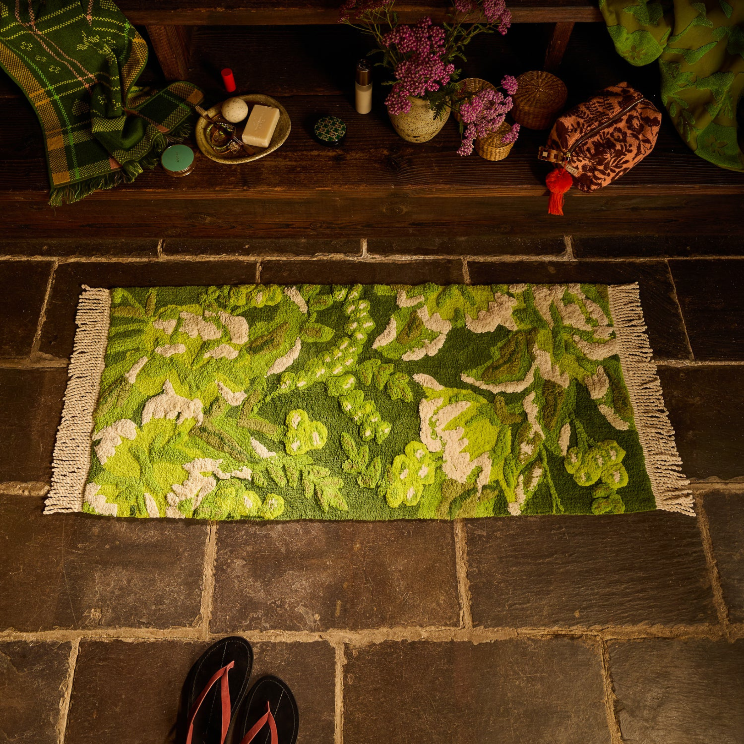 a gren floral print bath runner