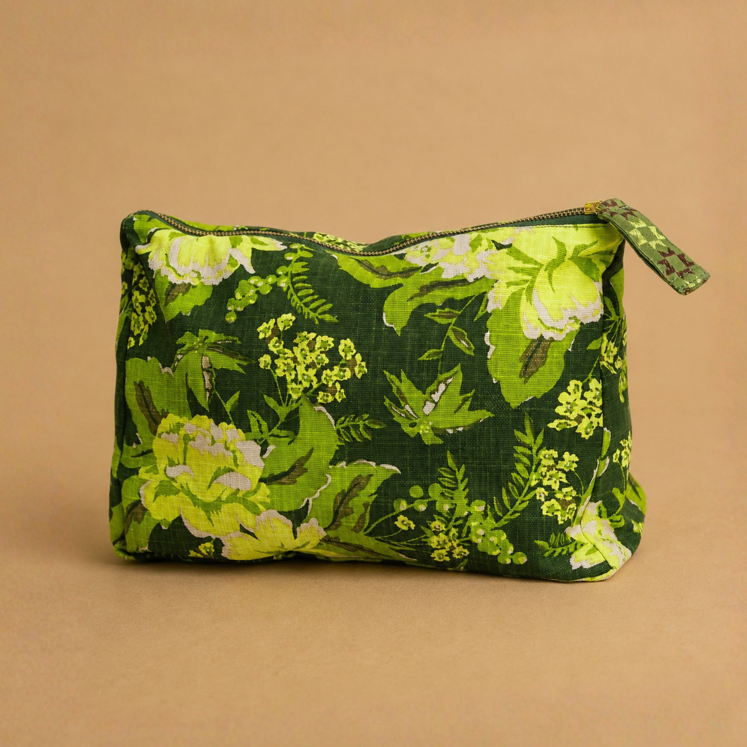 a green floral print cosmetic bag. 