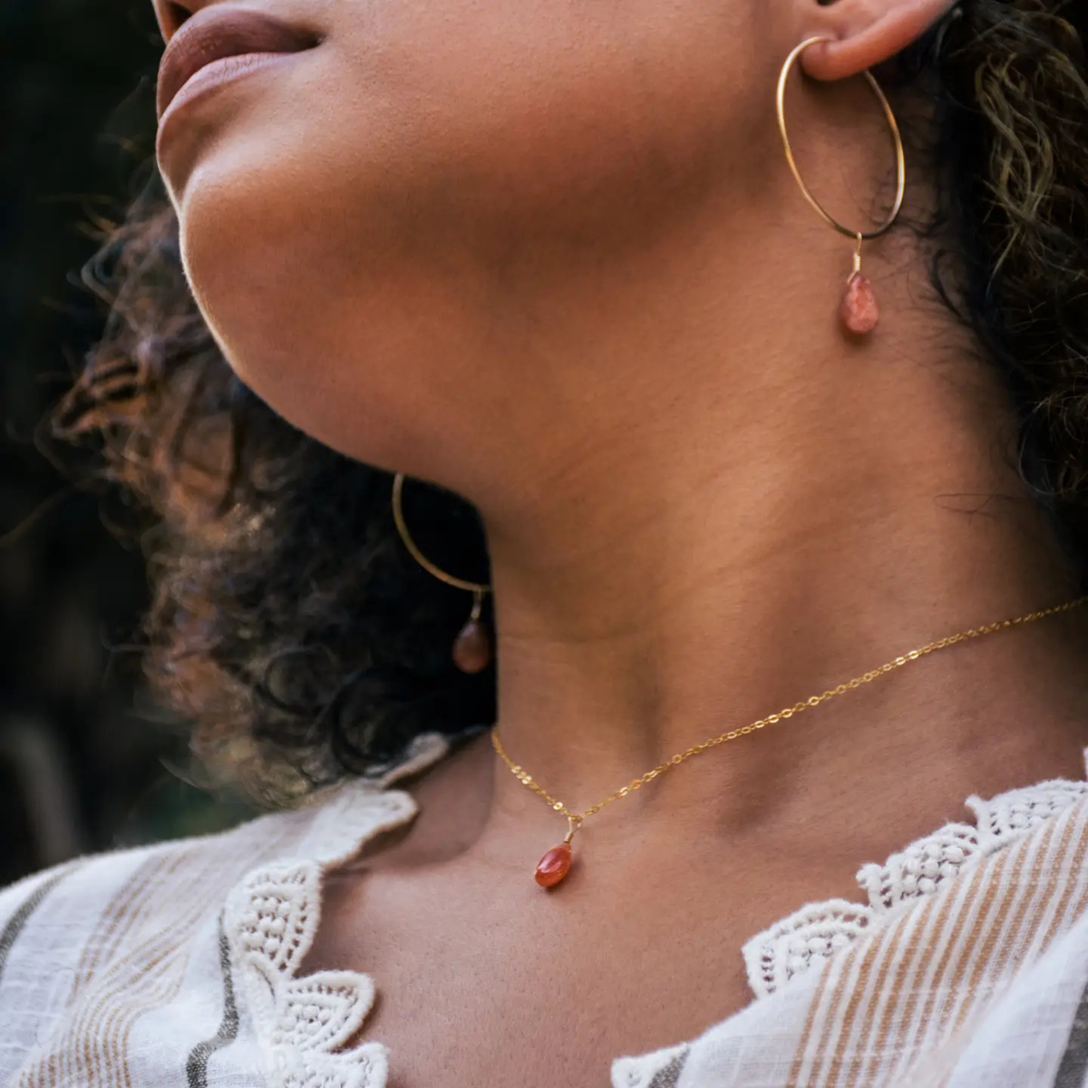 a sunstone pendant necklace.