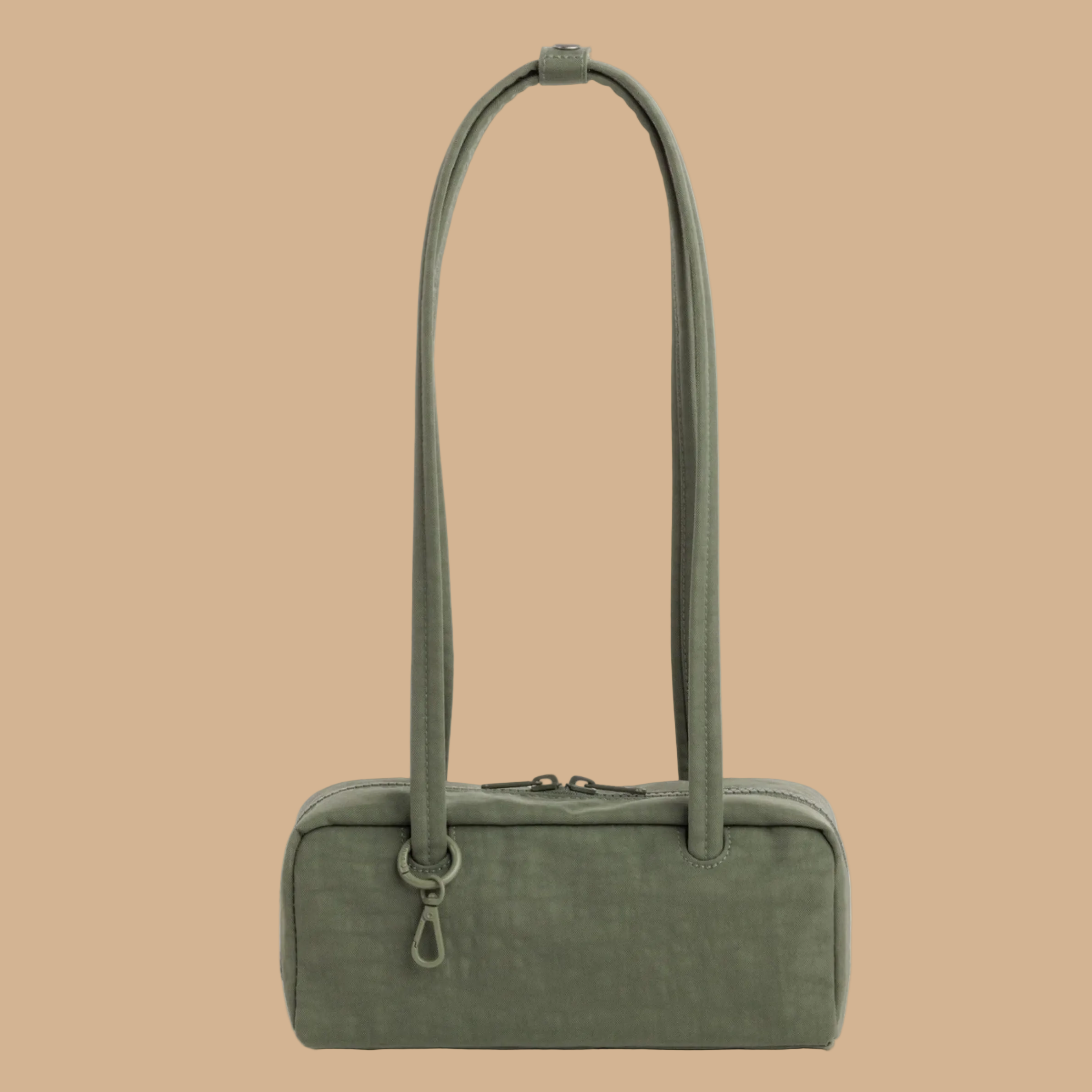 A green nylon shoulder bag.