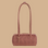 A rust and tan patterned shoulder bag.