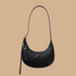 A black leather shoulder bag. 
