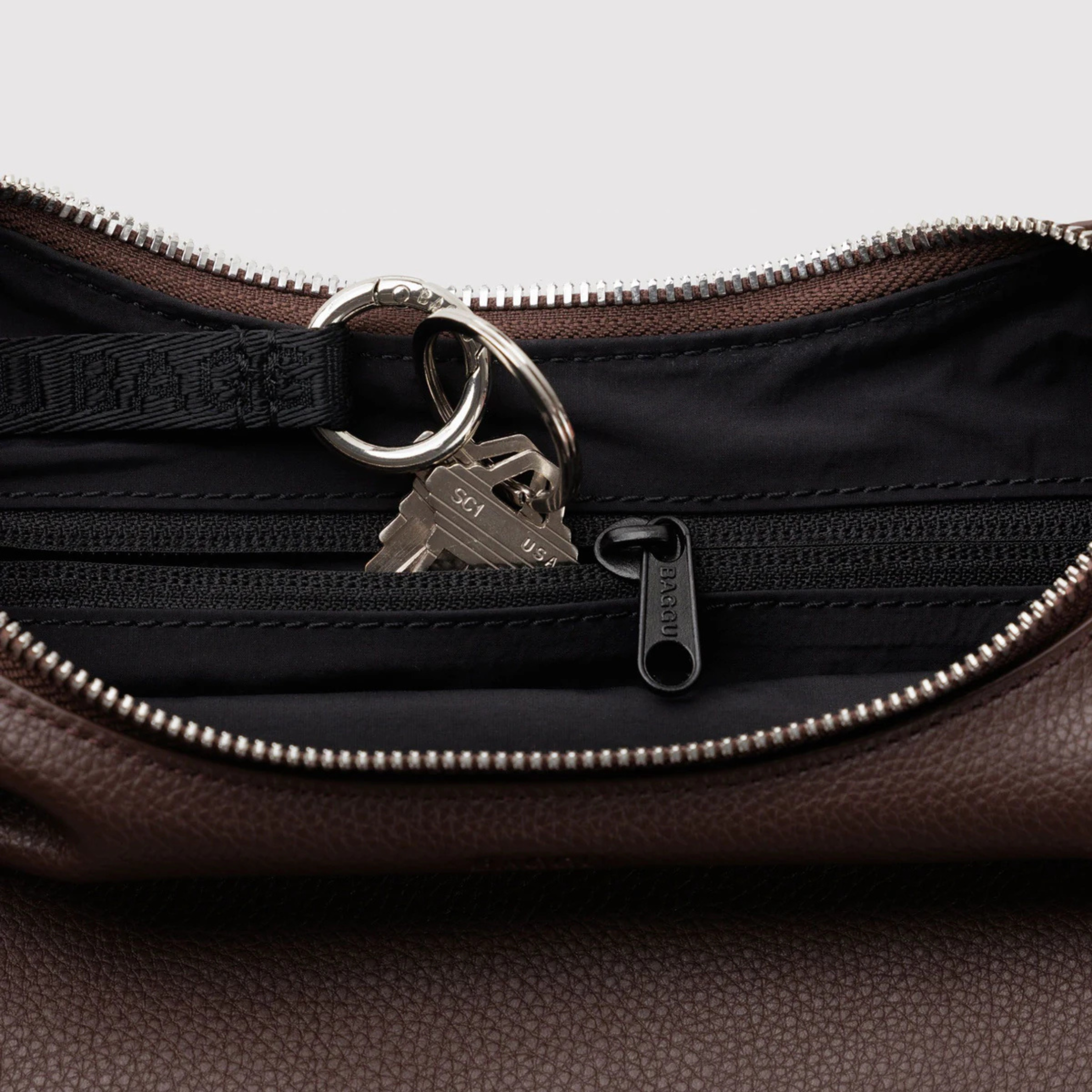 A brown leather handbag. 