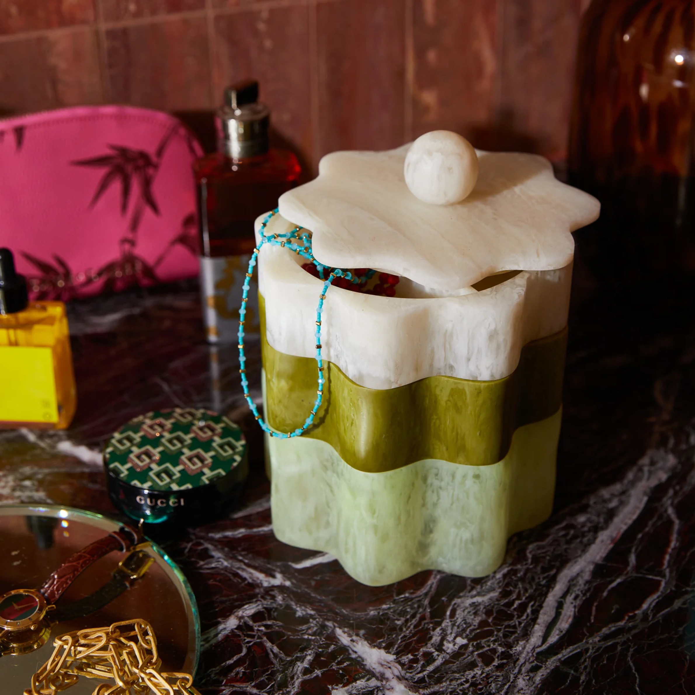an ivory and green stacking box set. 