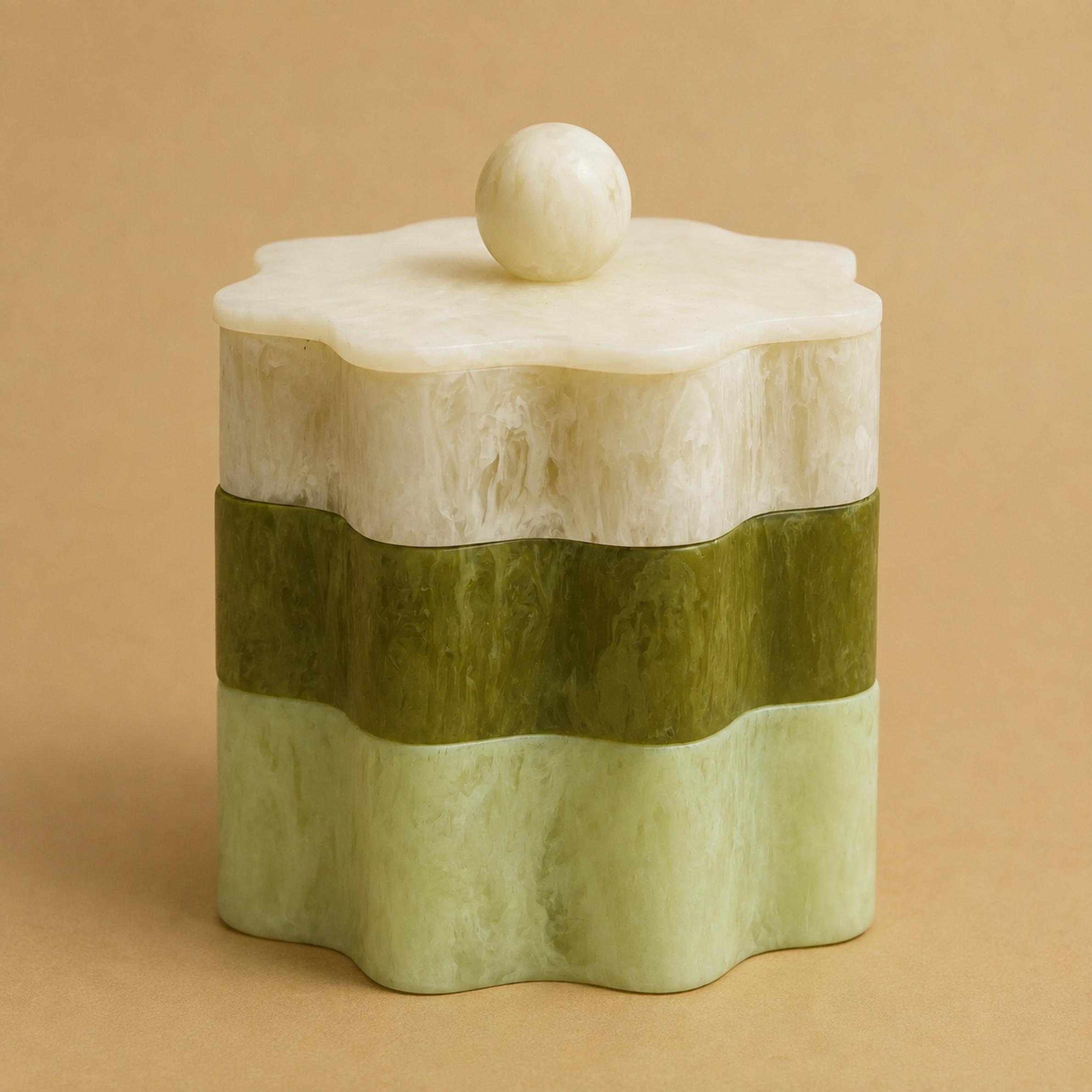 an ivory and green stacking box set. 