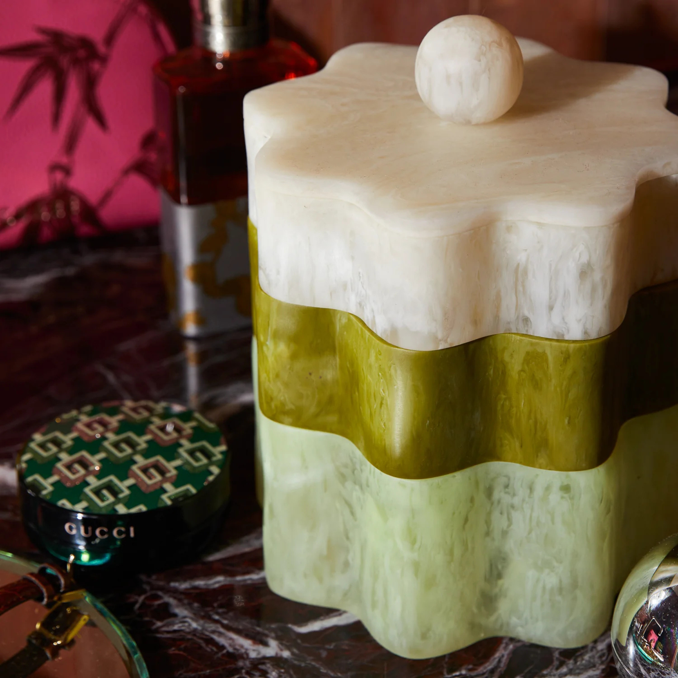 an ivory and green stacking box set. 