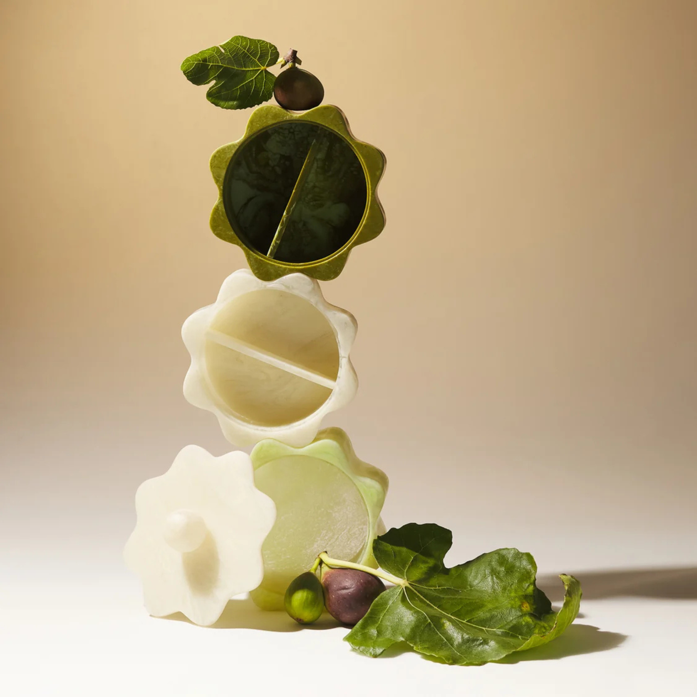 an ivory and green stacking box set. 