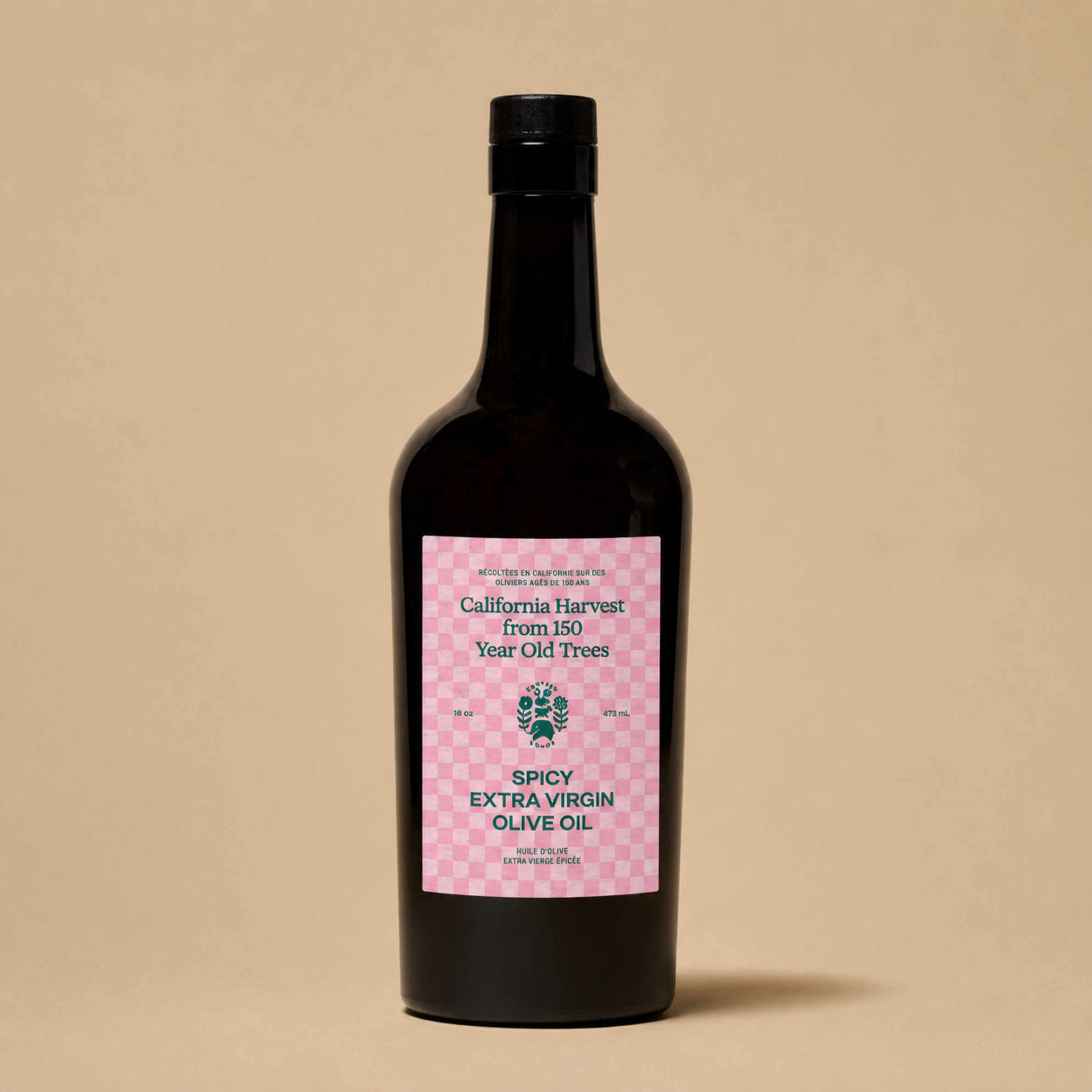A bottle of spicy olive oil with a pink checkered label. 